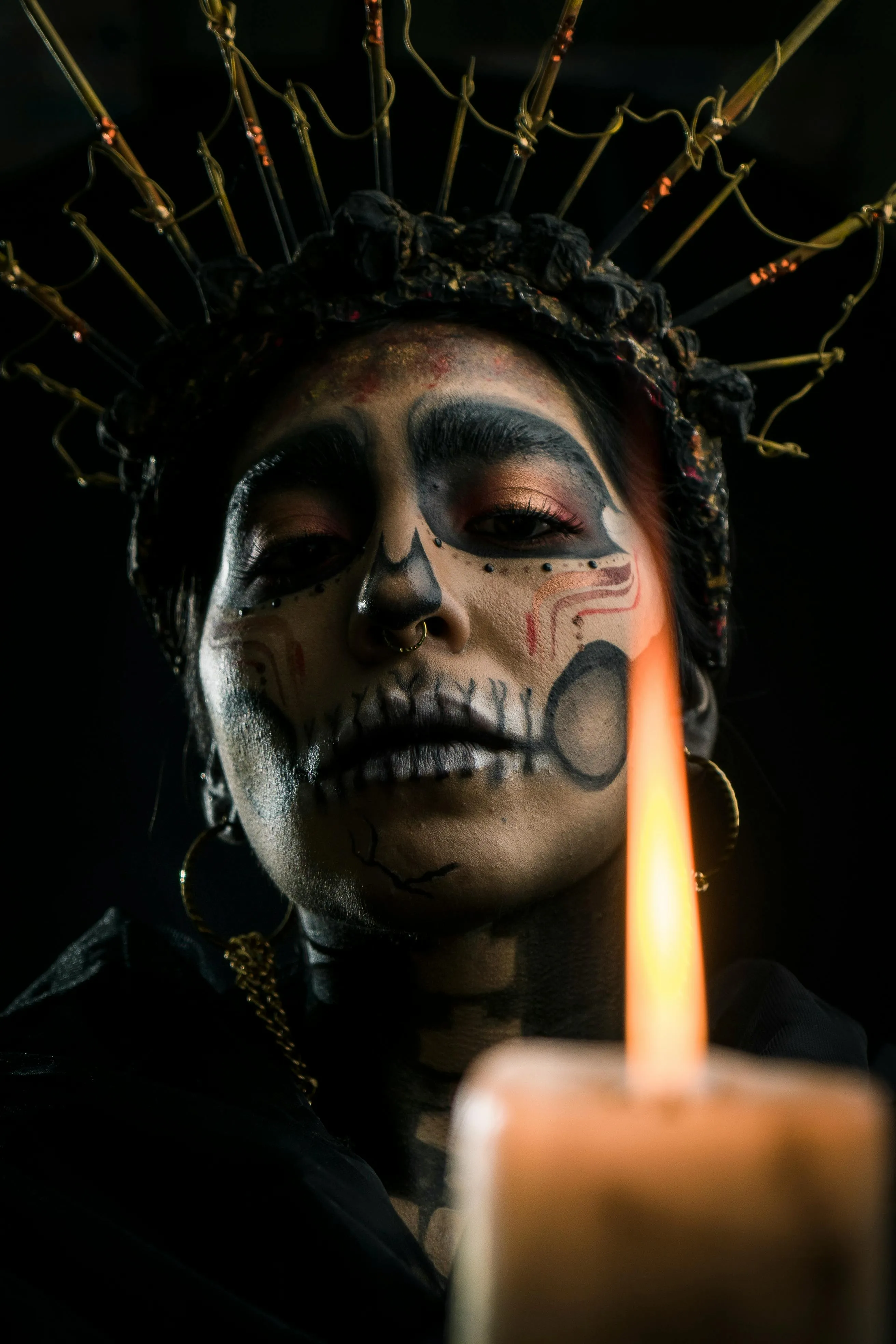 Dramatic Skeleton Makeup with Candlelight Illumination