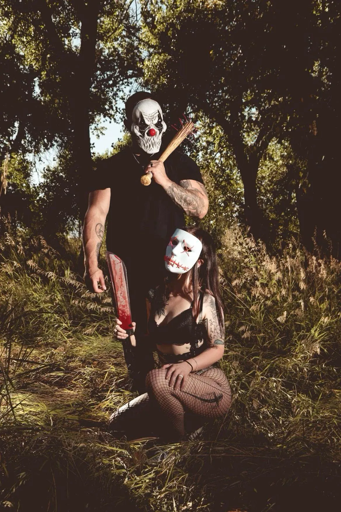Duo with Skeleton and White Masks in Forest at Dusk