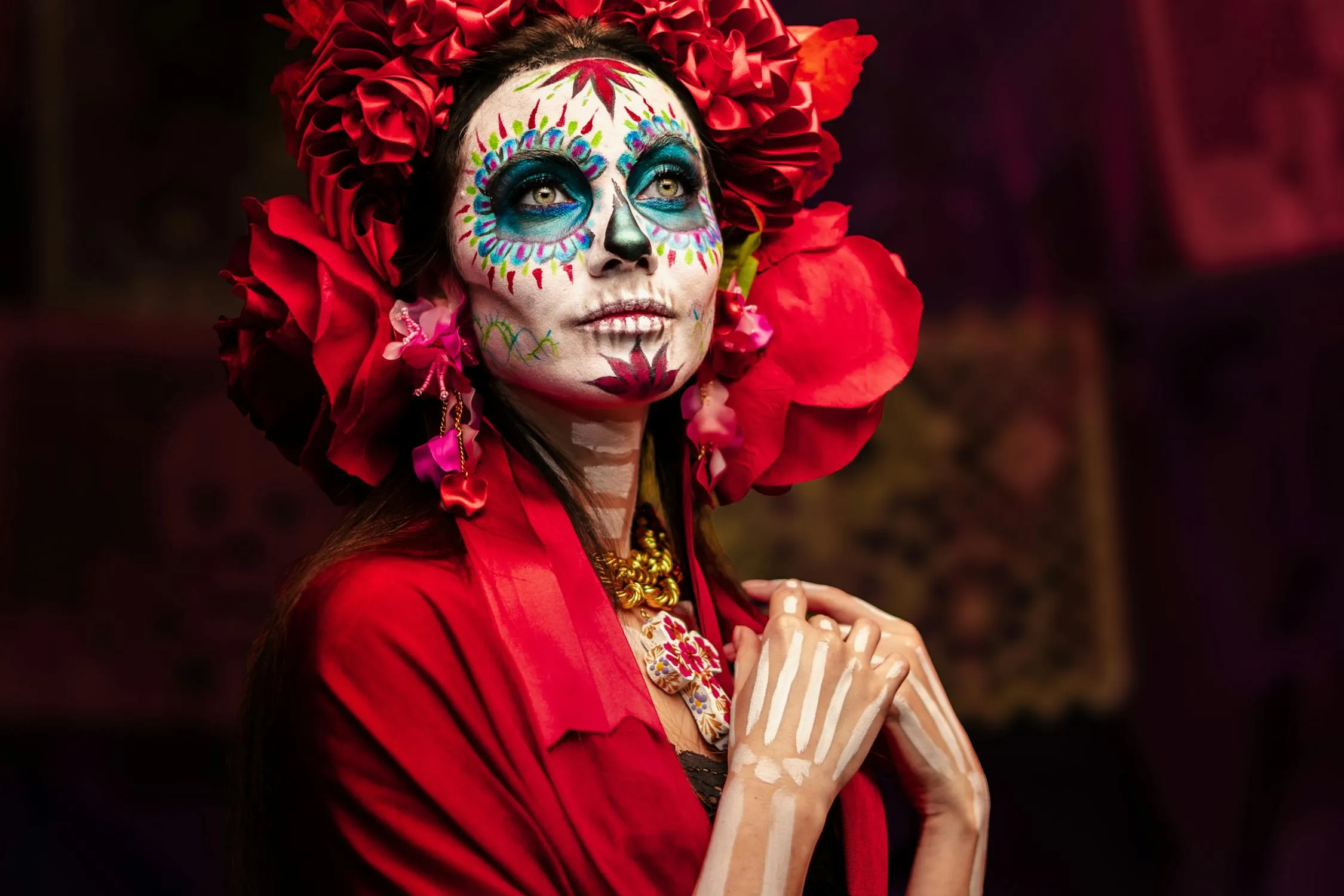 Elegant Day of Death Makeup with Vibrant Floral Headpiece