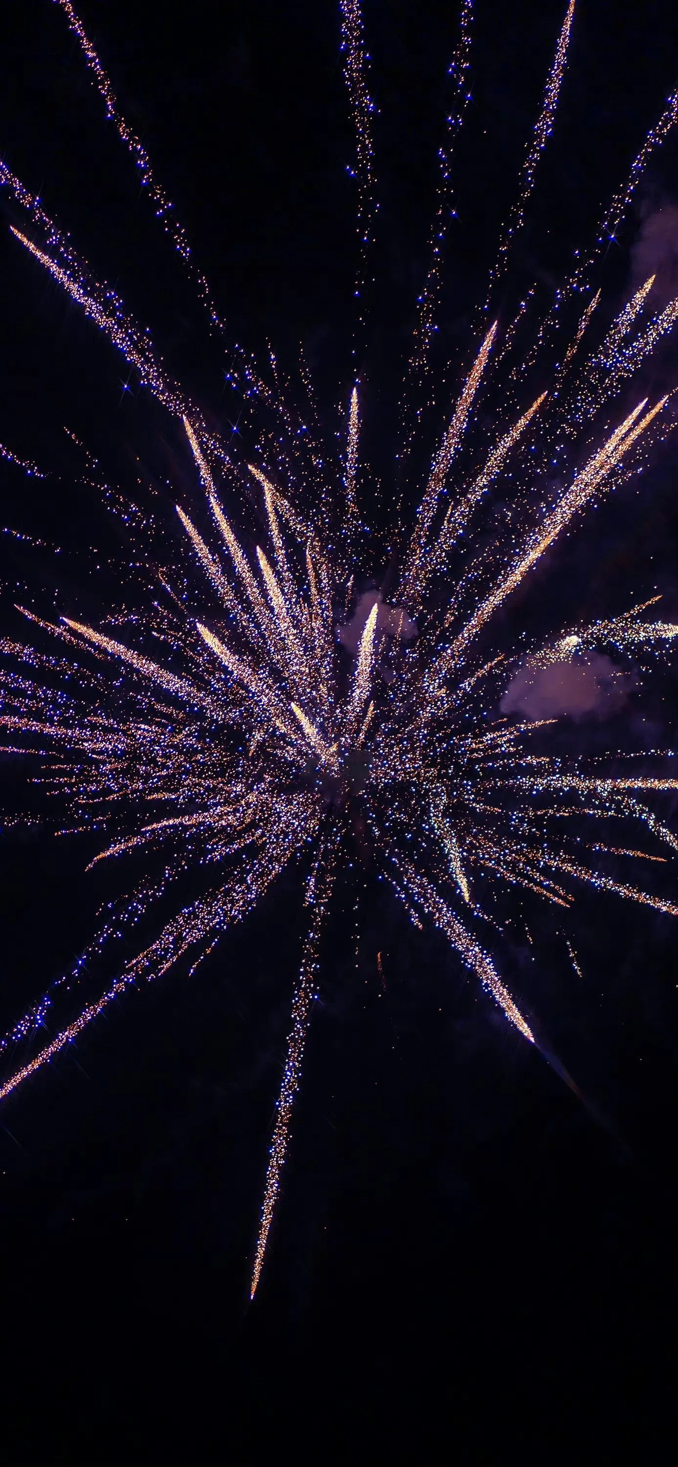 Elegant Fireworks Creating Long Sparkling Trails in the Sky