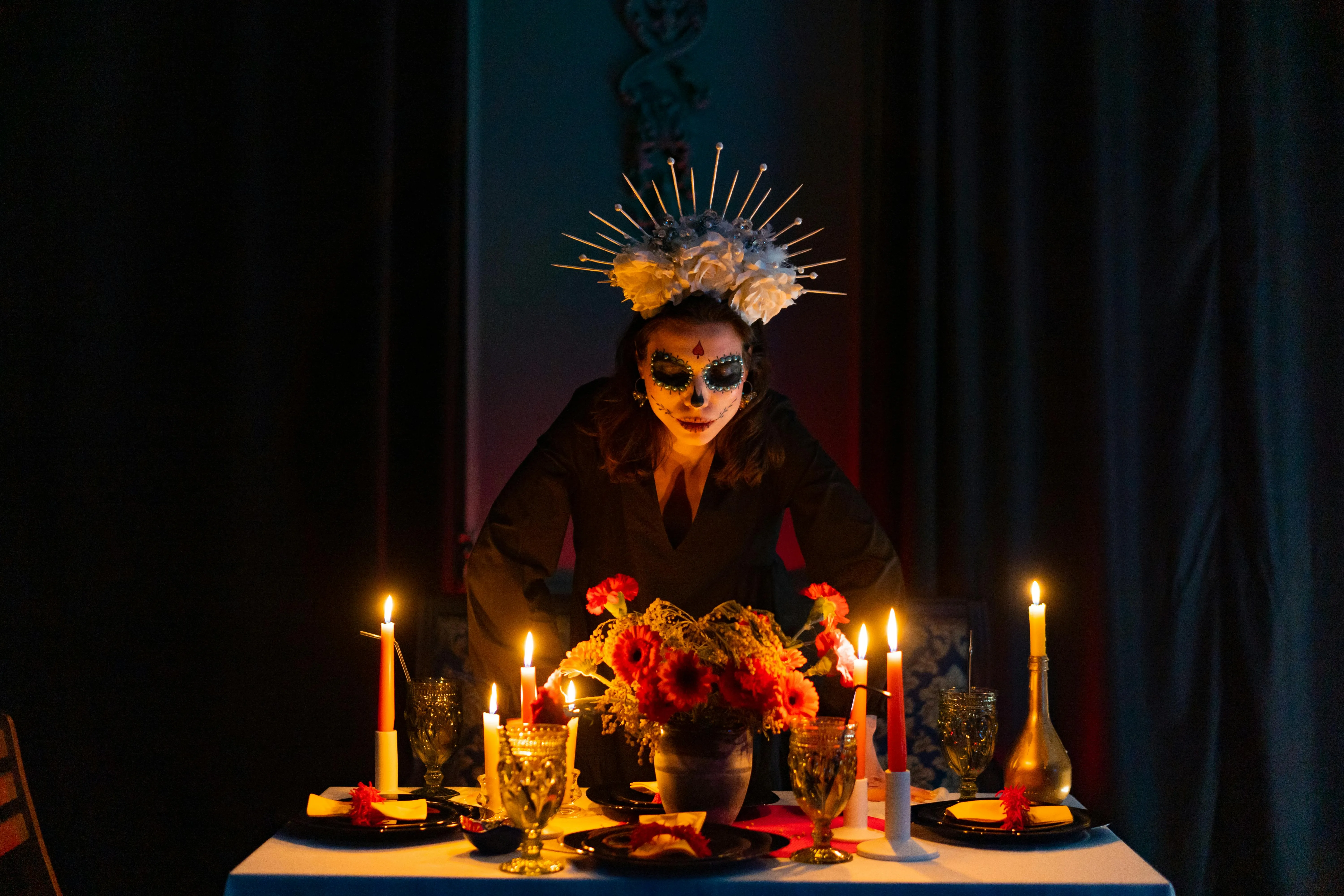 Elegant Halloween Altar Setup with Candles and Flowers