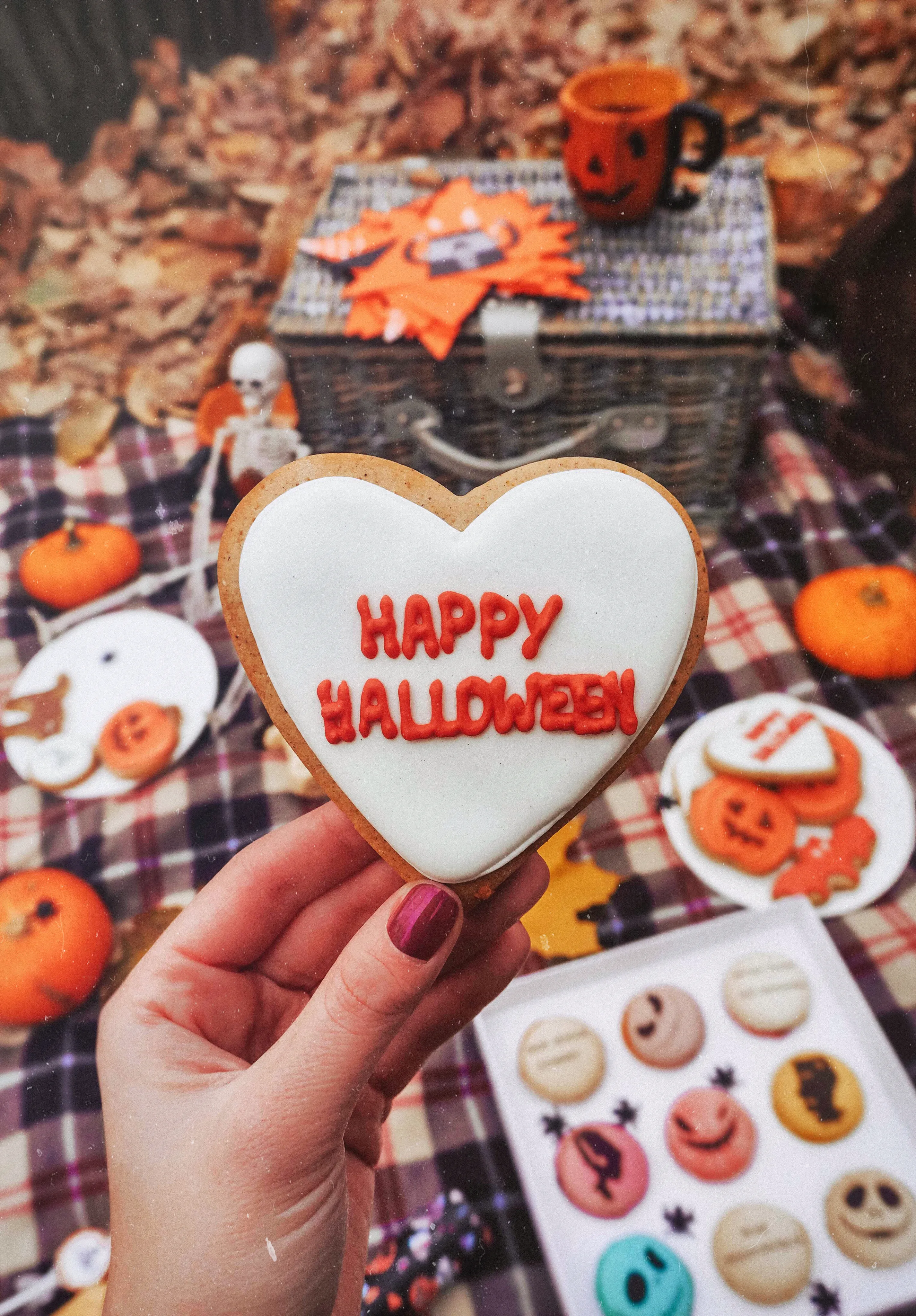 Festive Halloween Pumpkin Cookies and Party Setup Wallpaper