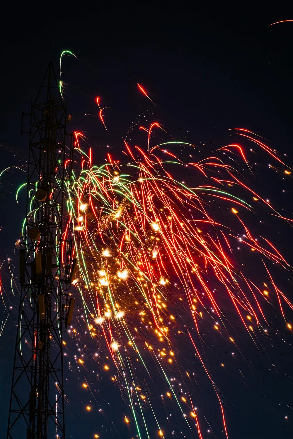 Fireworks display with bright colors lighting up the night