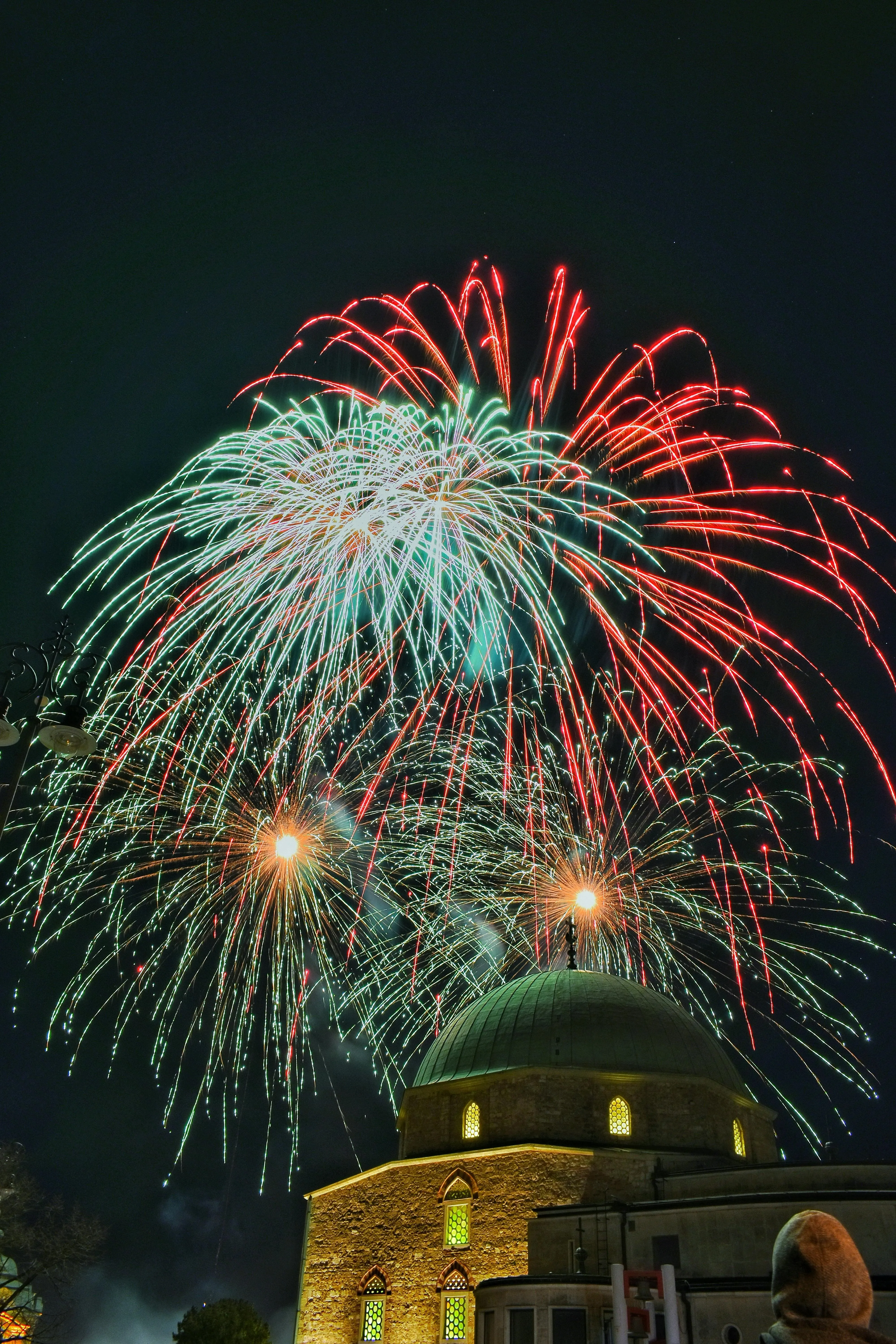 Fireworks Illuminating the Night above a Historic Landmark