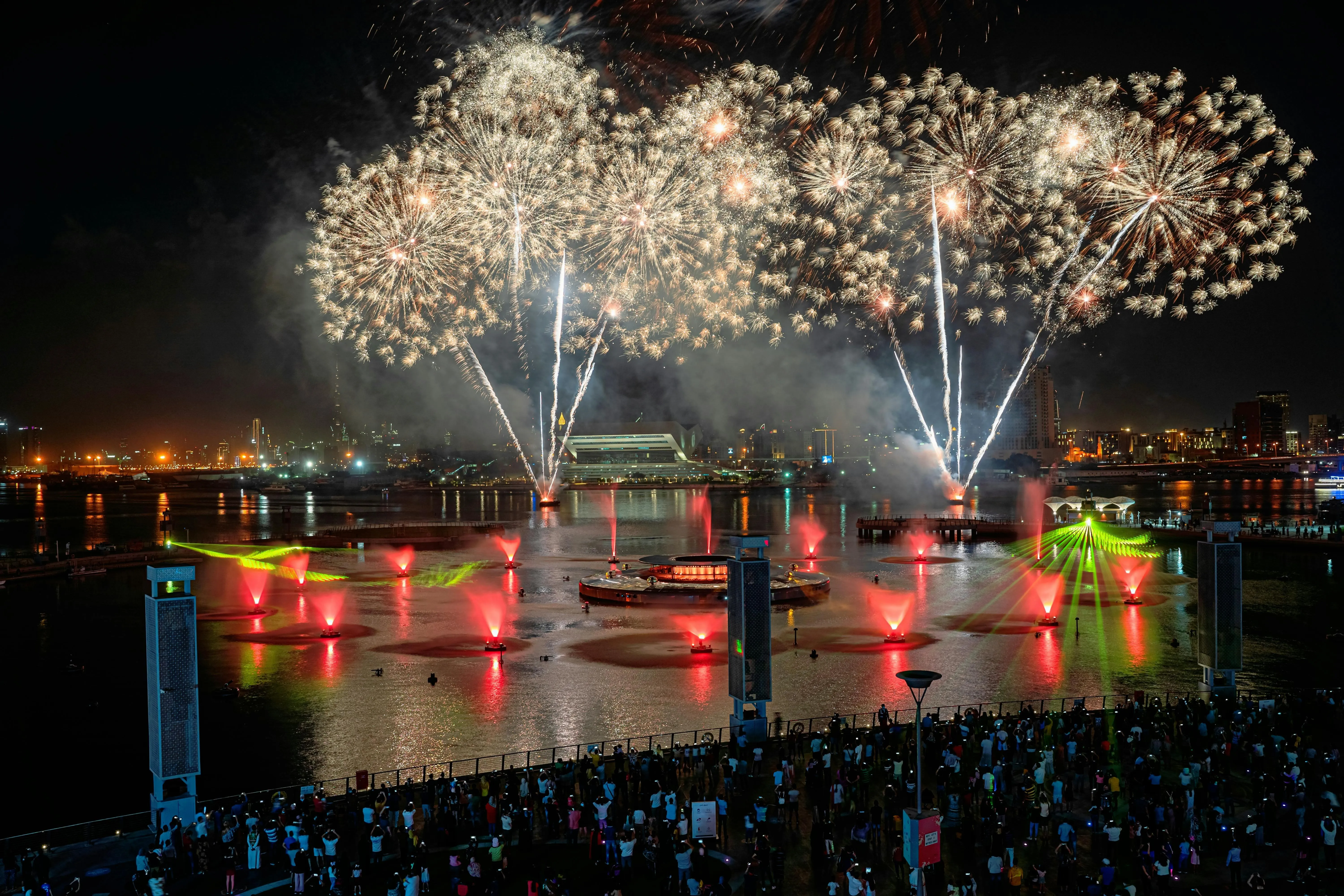 Fireworks Reflected on Water During a Night Festival