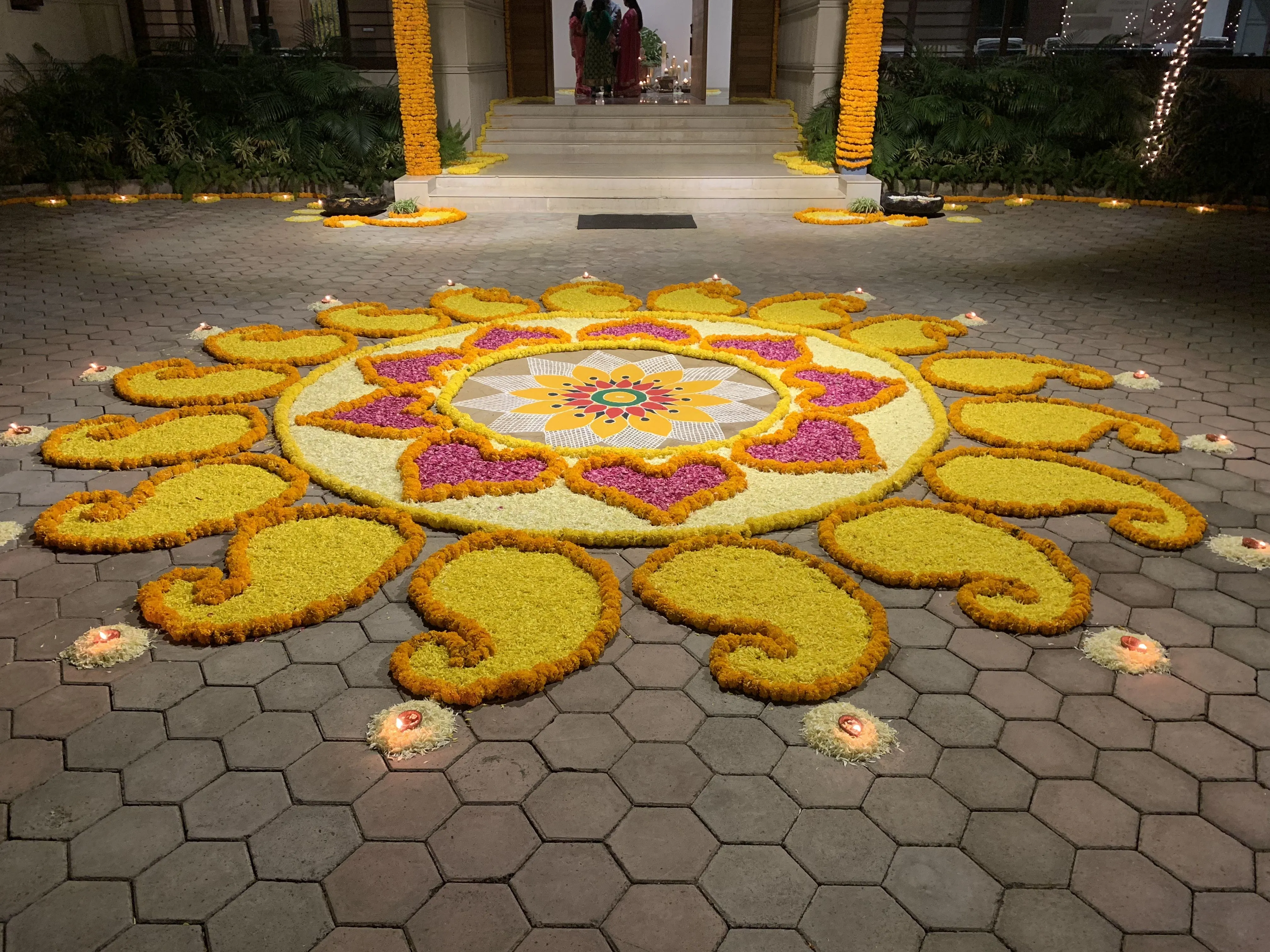 Floral Onam Athapookolam with Paisley Design petal image