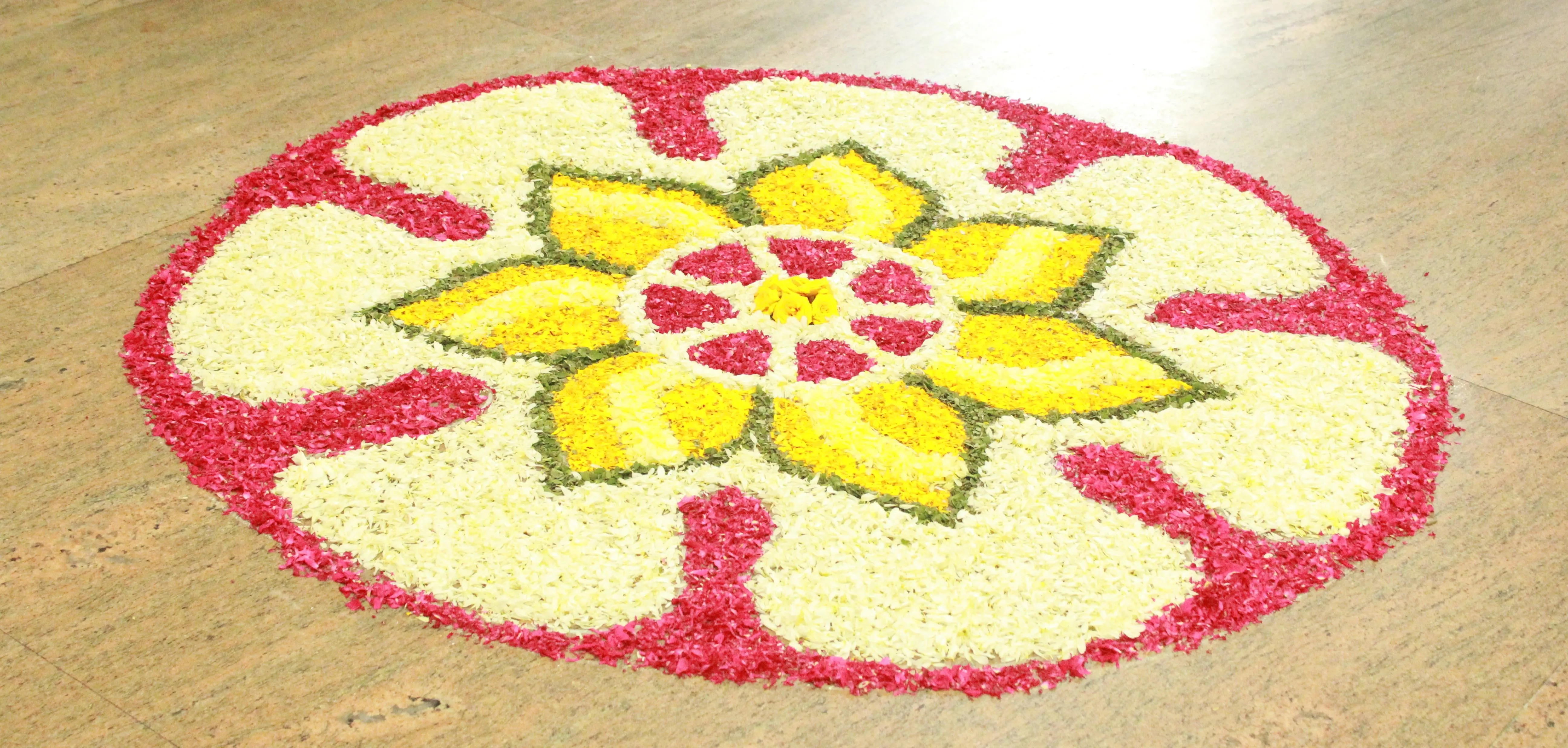Floral Onam Pookolam with yellow petal lotus pattern HD