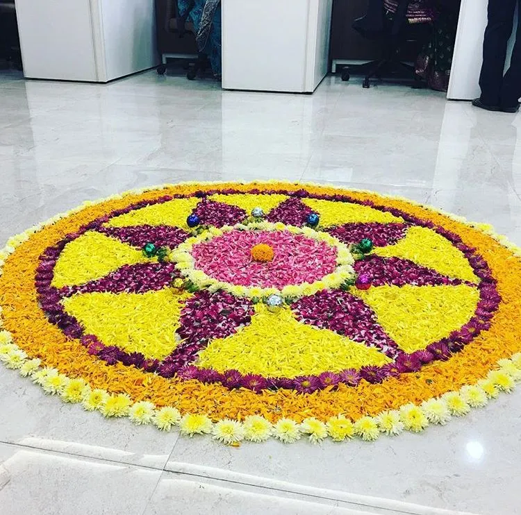 Floral pookolam design for office Onam celebration images