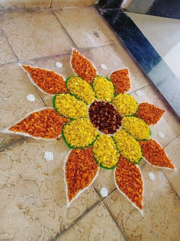 Flower pookolam Design with Yellow and Orange Flower Petals