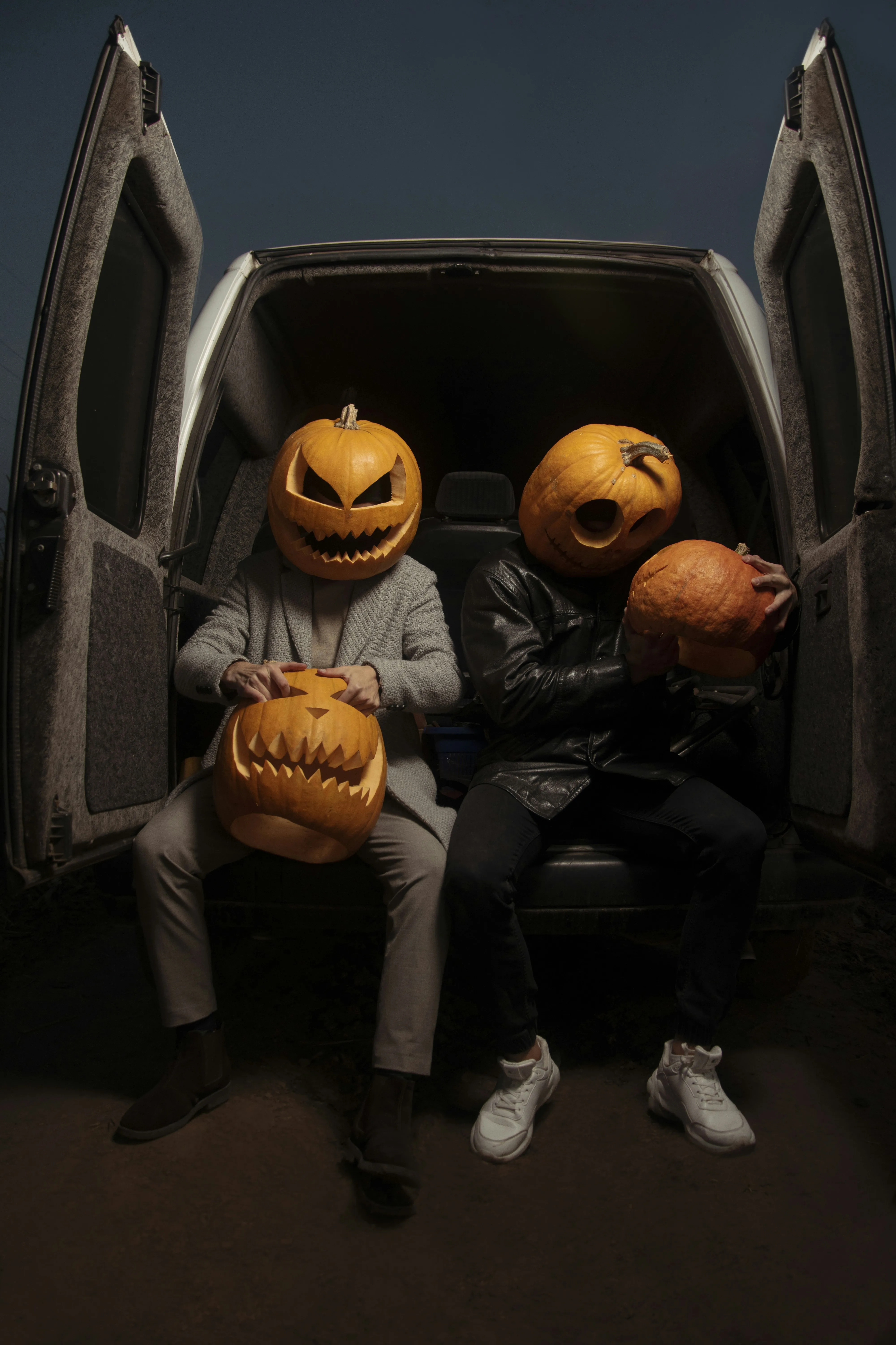 Friends with Pumpkin Heads at Halloween Night Wallpaper