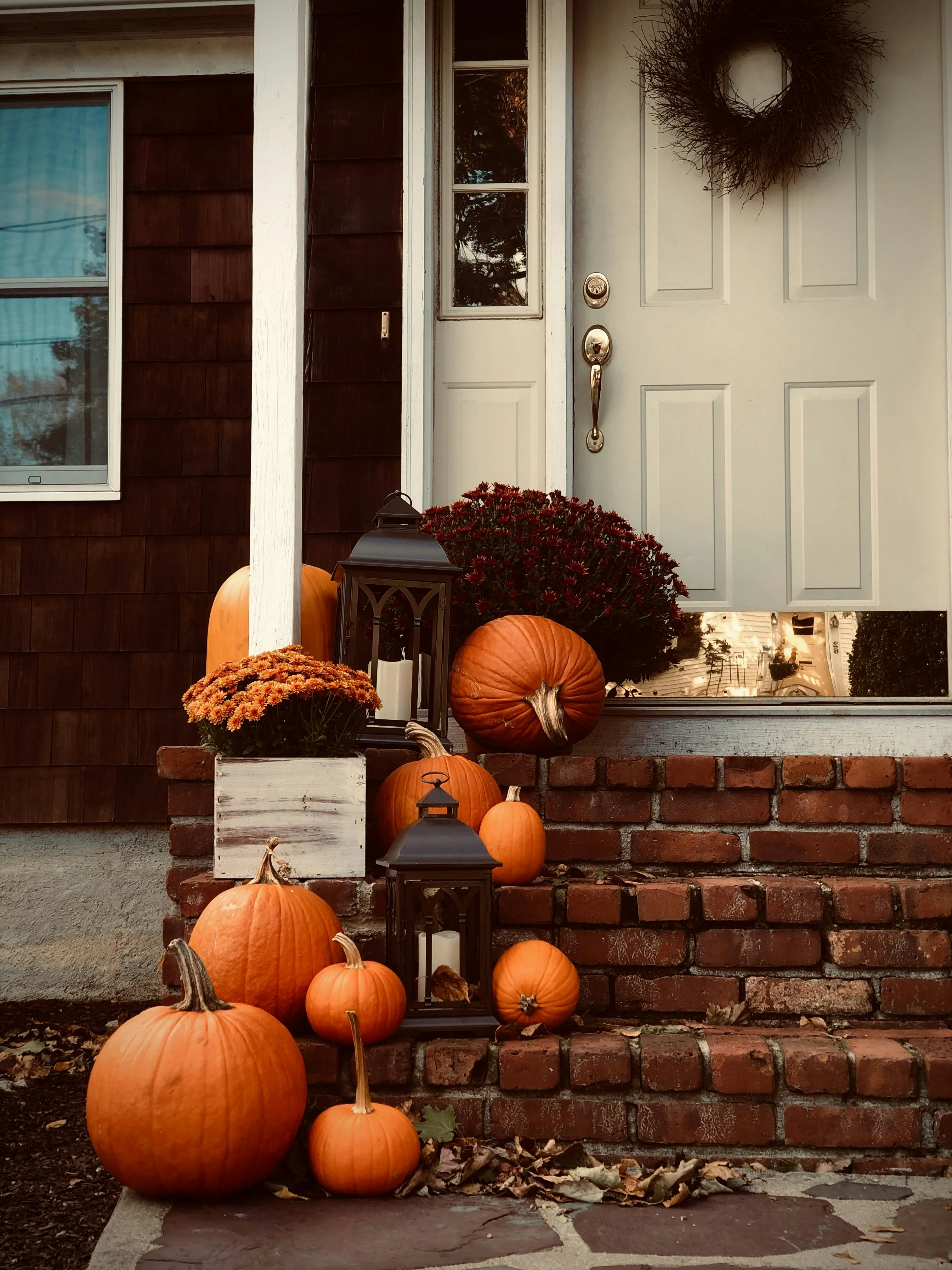 Front Porch Decoration with Pumpkins and Autumn Wreath