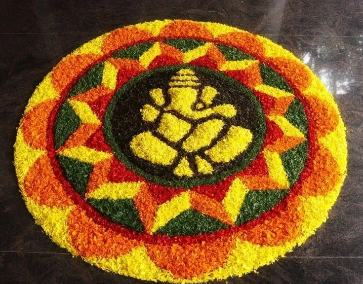 Ganesha Pookalam Design with Floral Design for Onam and Puja