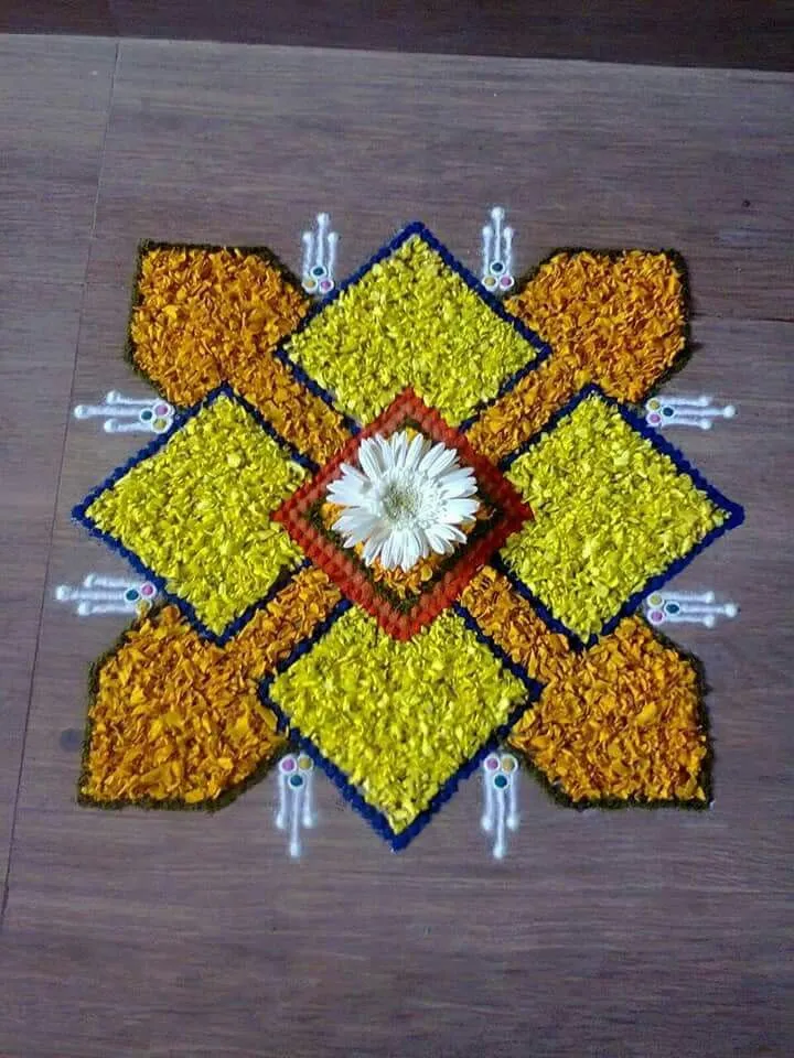 Geometric Floral Kolam with marigold Petals HD Wallpaper