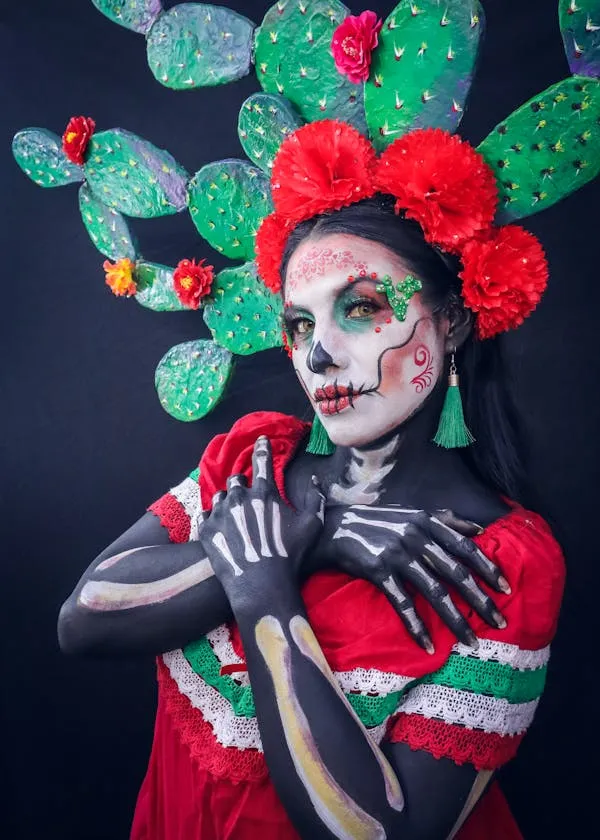 Girl in Colourful Face Paint with Halloween Skeleton Theme