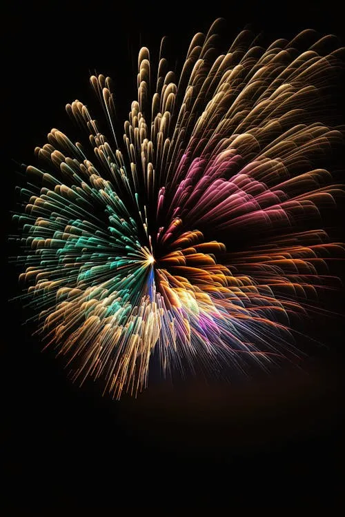 Glowing Fireworks with Rich and Radiant Colors Wallpaper