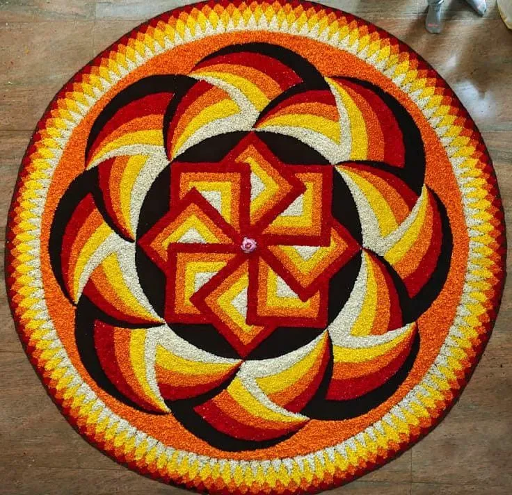 Grand geometric Onam pookolam design with spiral patterns