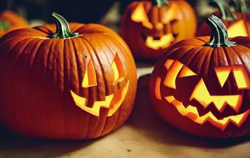Group of Carved Halloween Pumpkins Glowing Brightly HD