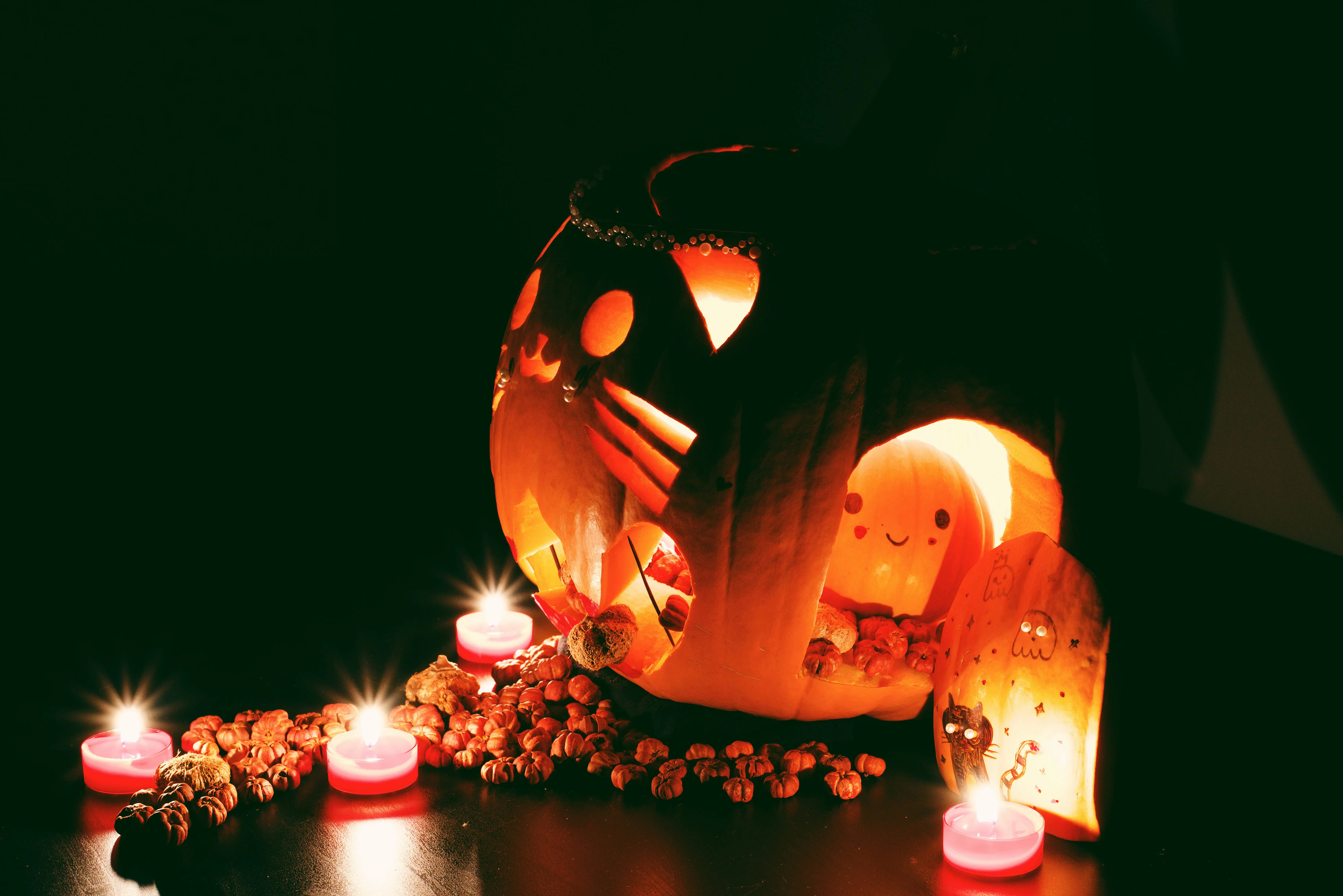 Group Of Lit Pumpkins in Dark Halloween Atmosphere Image