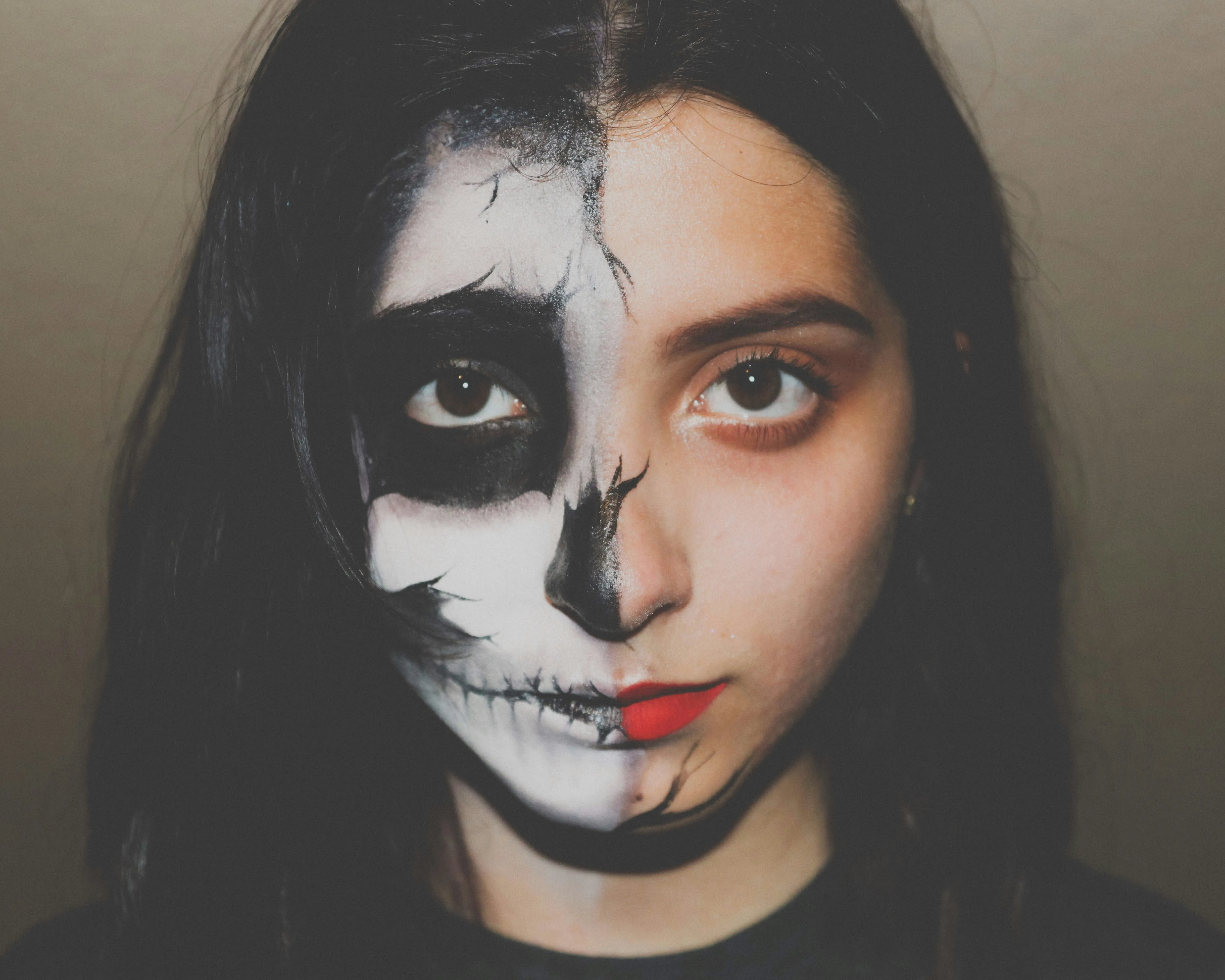 Half Face Skull Makeup for Halloween Festival Wallpaper