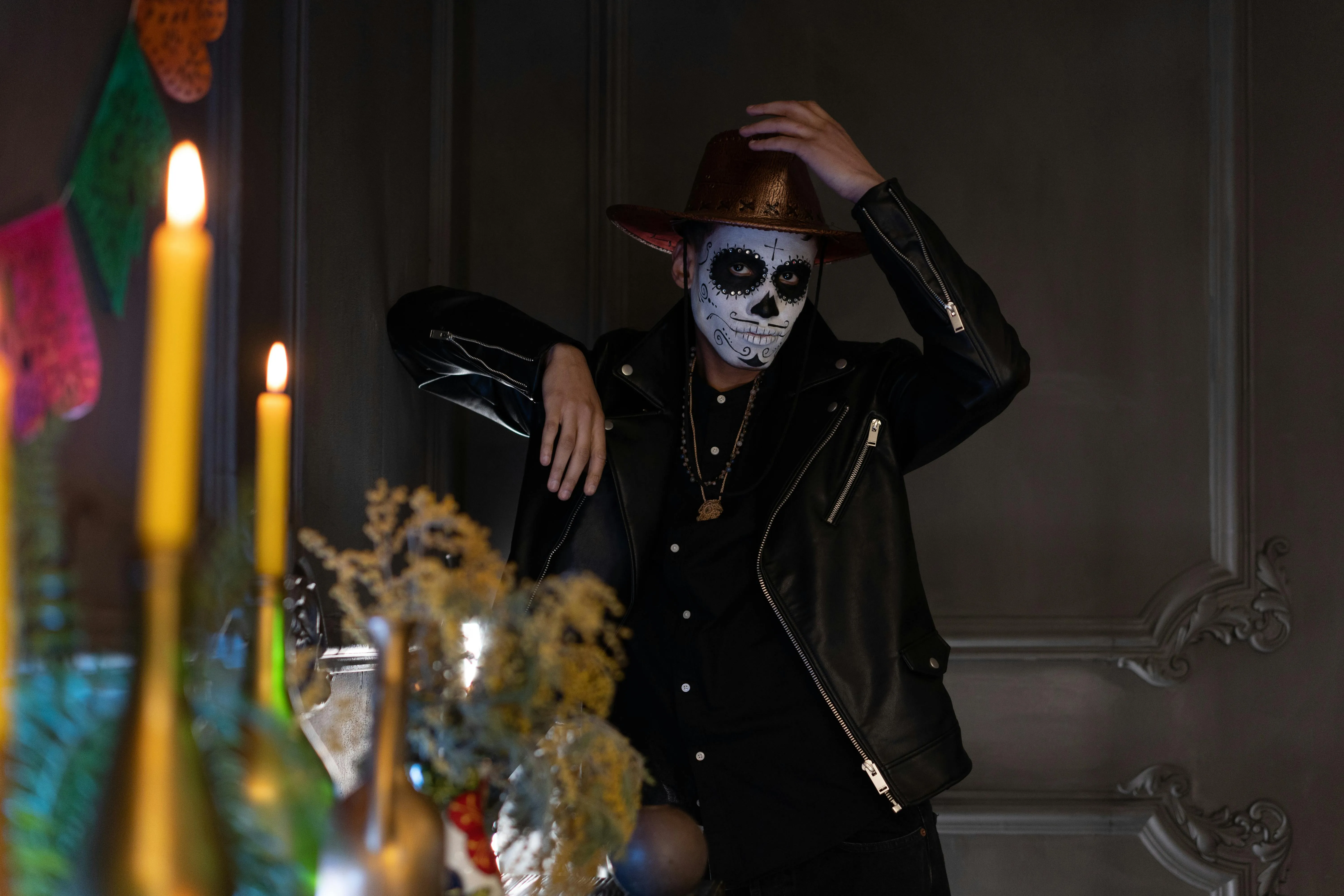 Halloween Celebration with Skull Mask and Candles Wallpaper