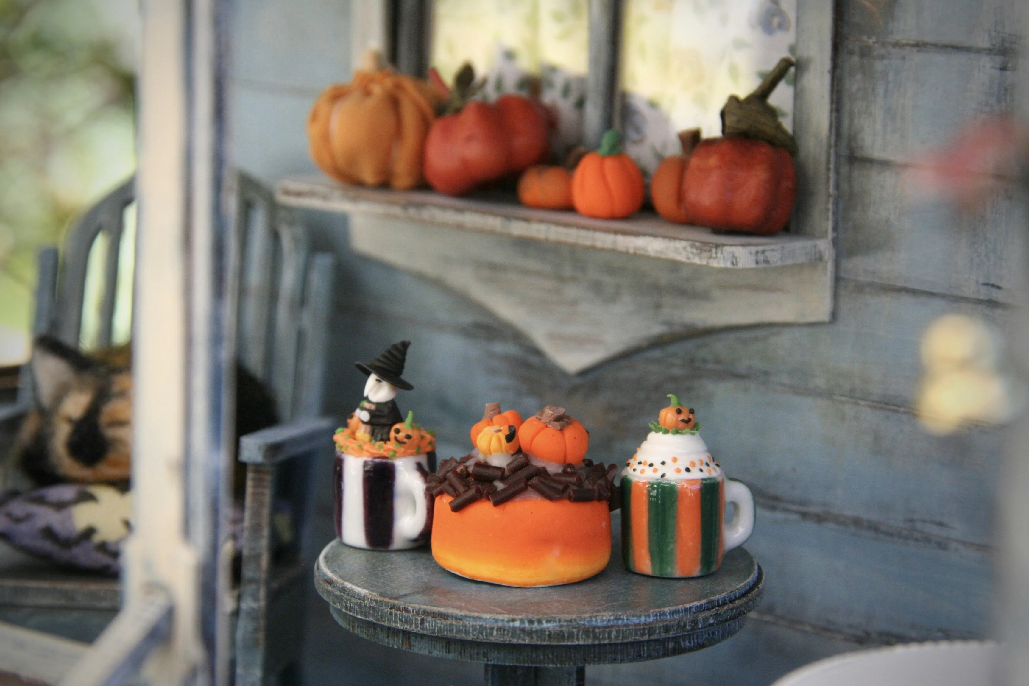 Halloween Decor Display with Pumpkins and Seasonal Treats