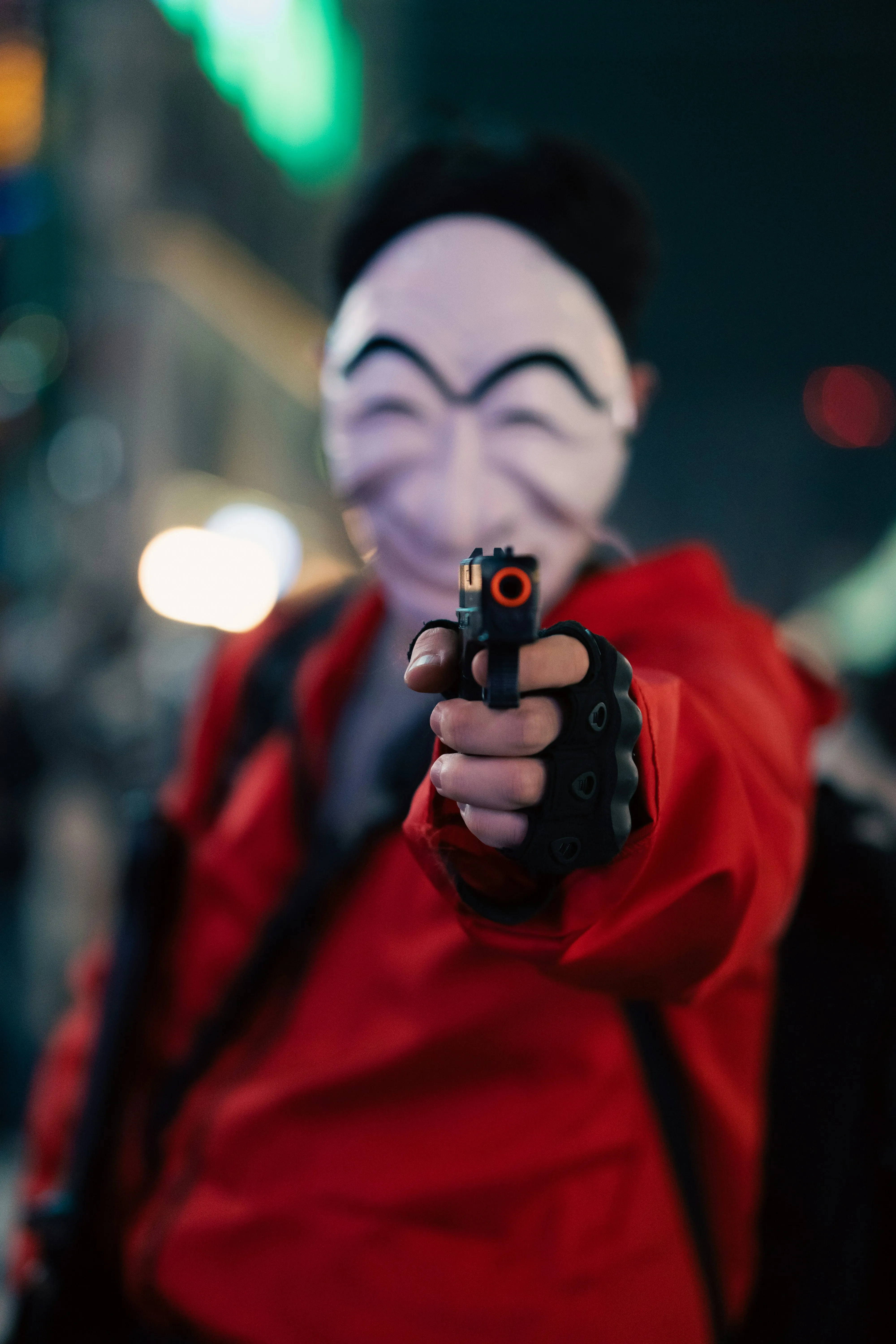 Halloween Festival Costume with Mask and Prop Gun Wallpaper