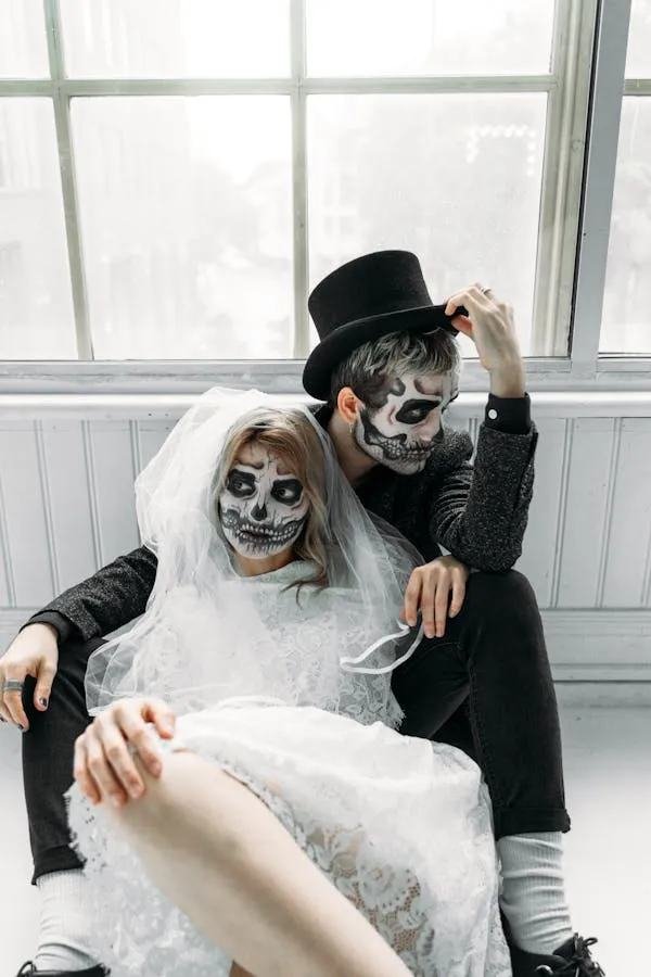 Halloween festival couple in skeleton costumes together