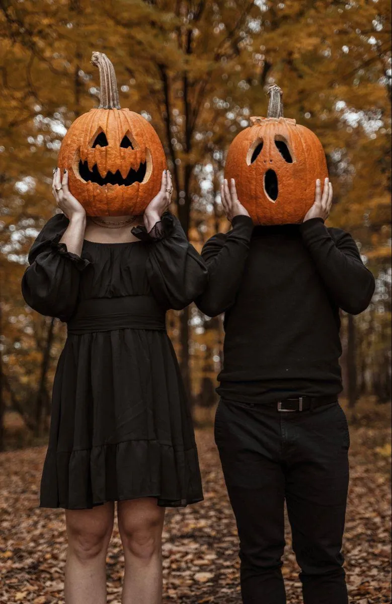 Halloween Festival Couple Wearing Matching Pumpkin Masks
