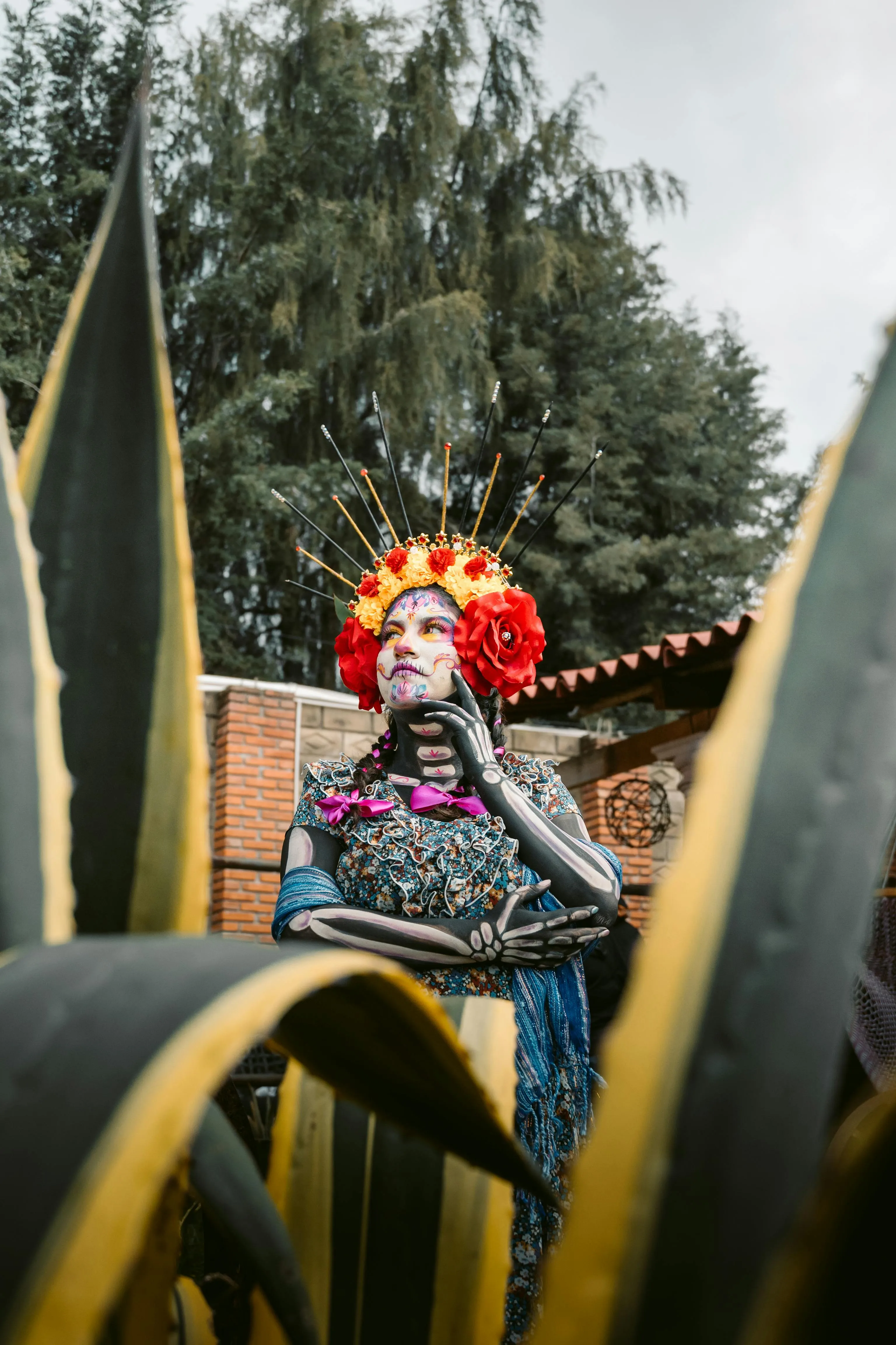 Halloween Festival Participant with Bright Floral Headpiece