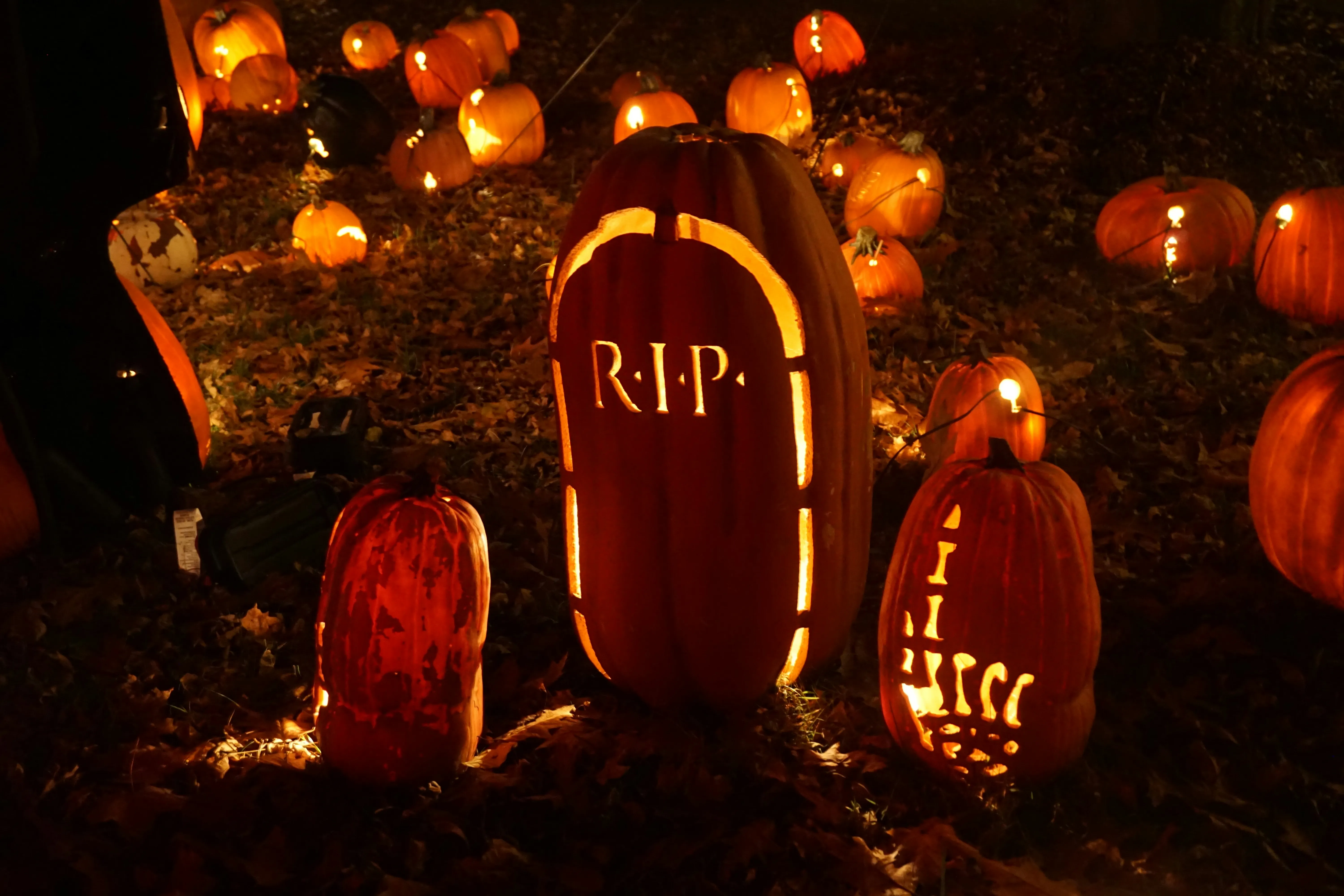 Halloween Graveyard Scene with Jack O Lanterns Wallpaper