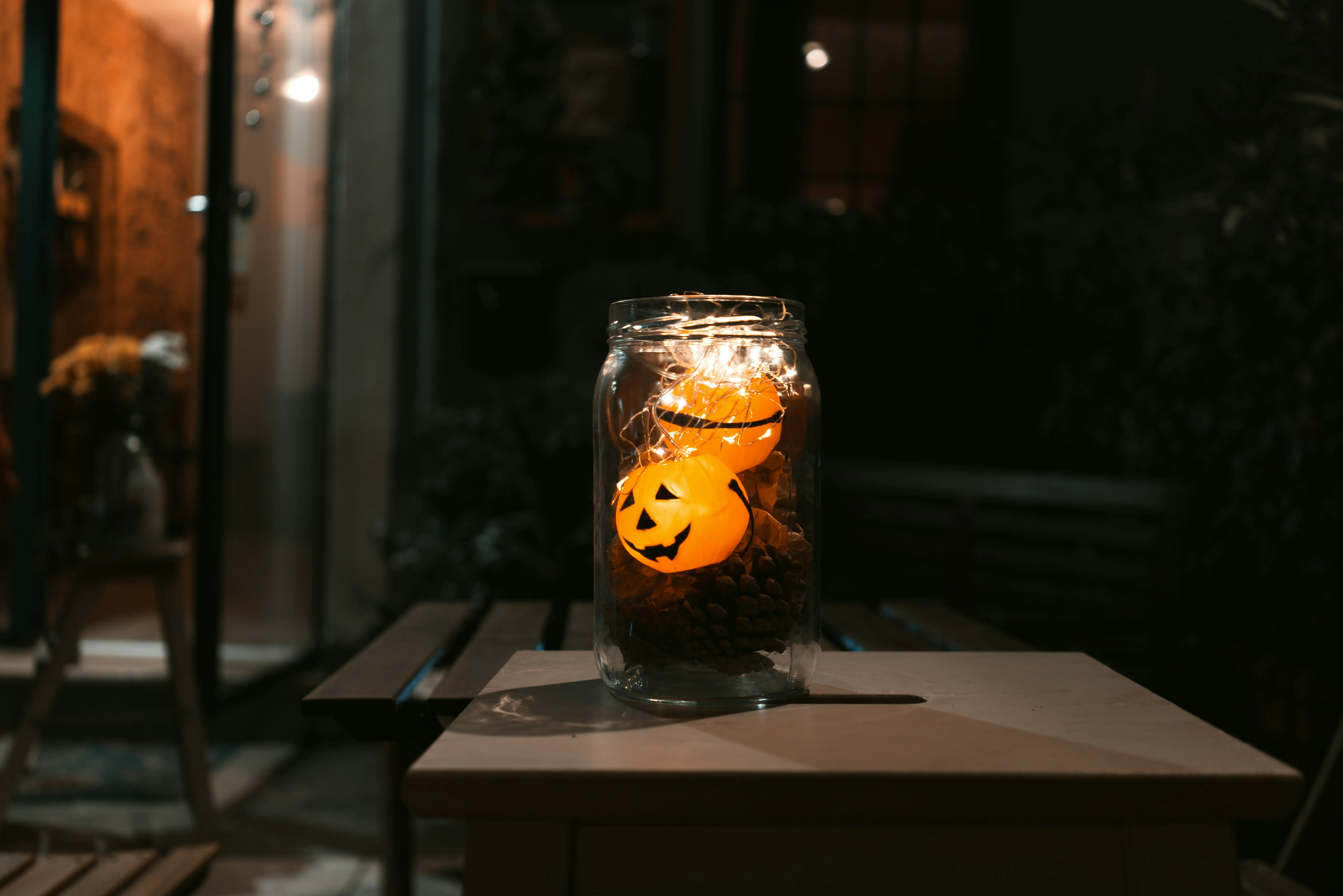 Halloween Jar Lantern with Pumpkin Face Glow Wallpaper