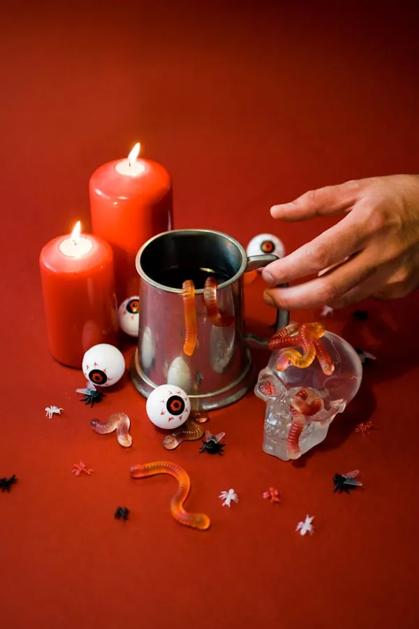 Halloween Mug with Pumpkins and Burning Red Candles Wallpaper