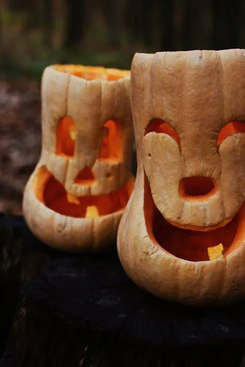 Halloween Pumpkin Lanterns with Funny Faces on Display