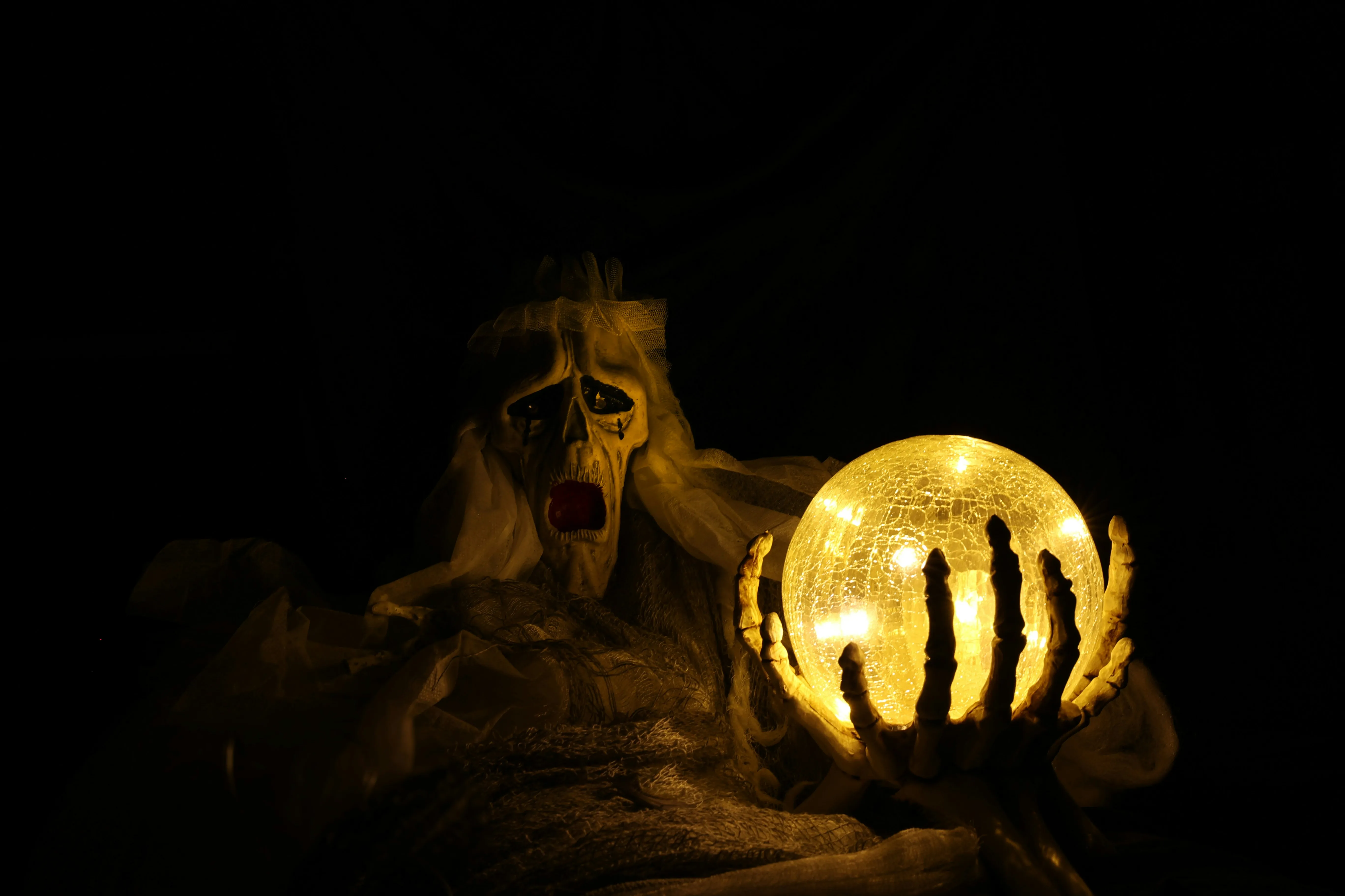 Halloween Spirit Holding Glowing Orb at Night Scary Wallpaper