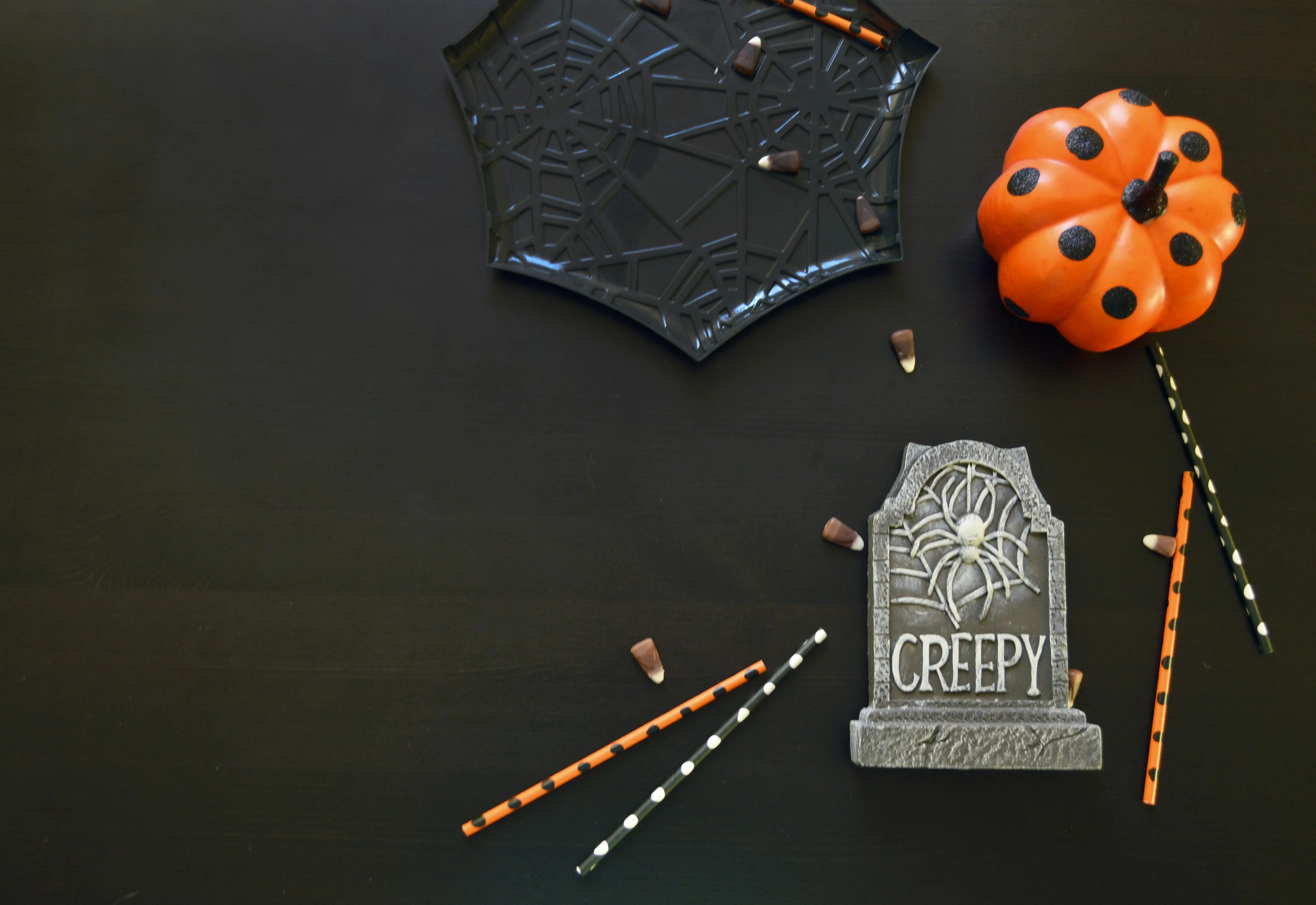Halloween Table Setup with Spider and Gravestone Wallpaper