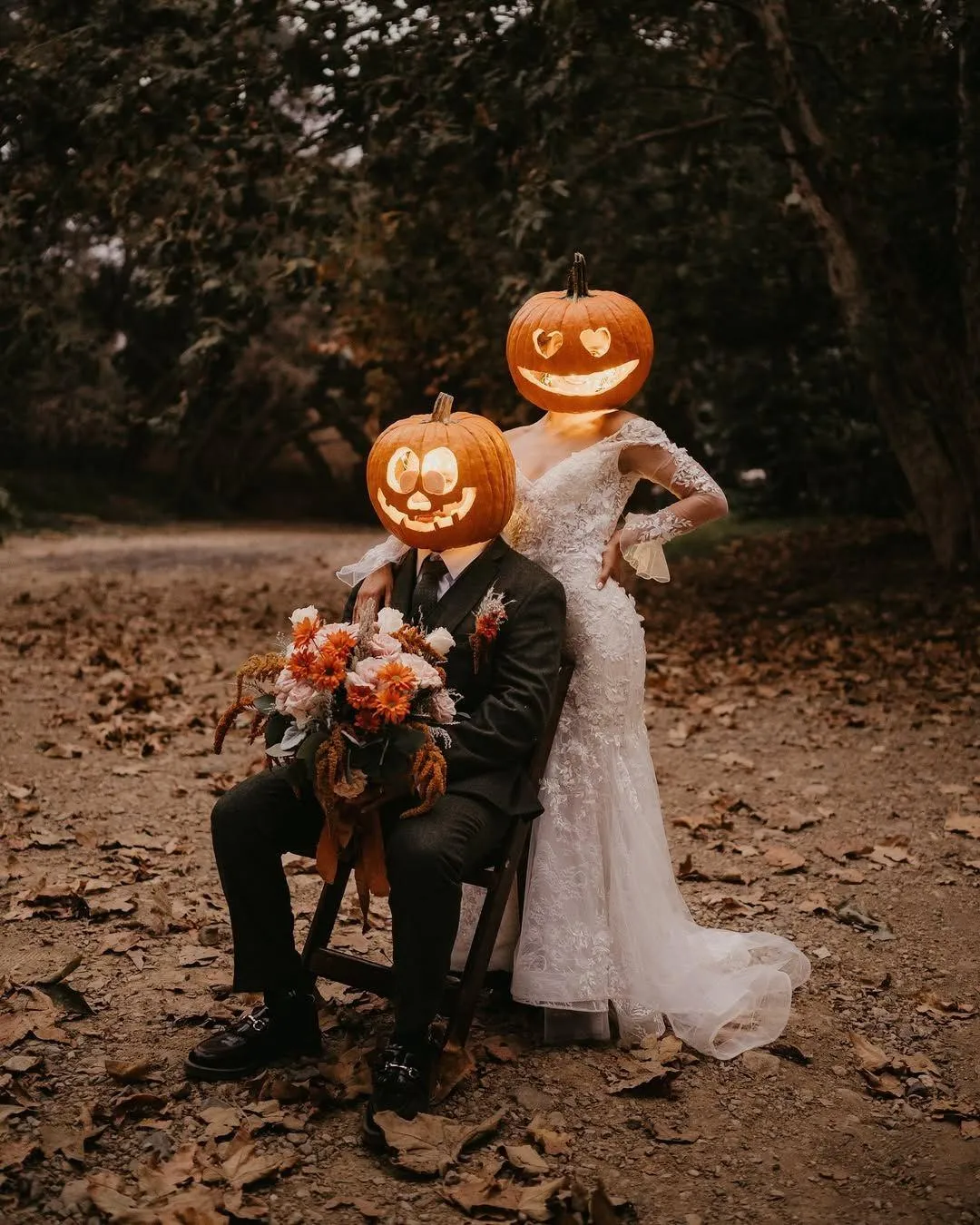 Halloween Wedding Theme with Pumpkin Heads and Flowers