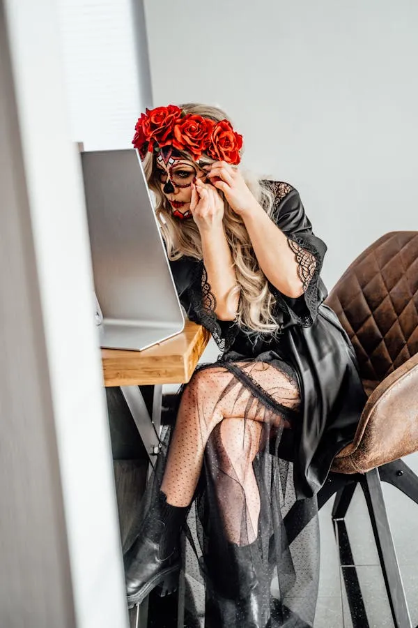 Halloween Woman in Floral Headpiece and Striking Makeup