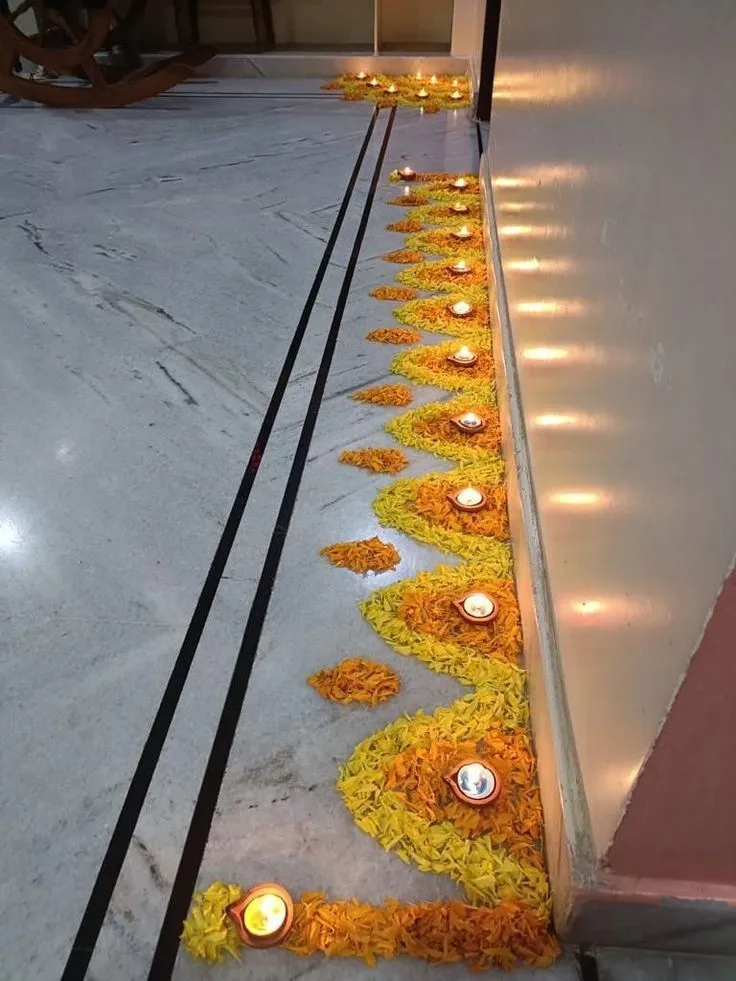 Hallway decoration ideas with marigolds and oil lamp image