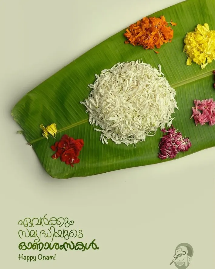 Happy Onam text with Malayalam and colourful flower design
