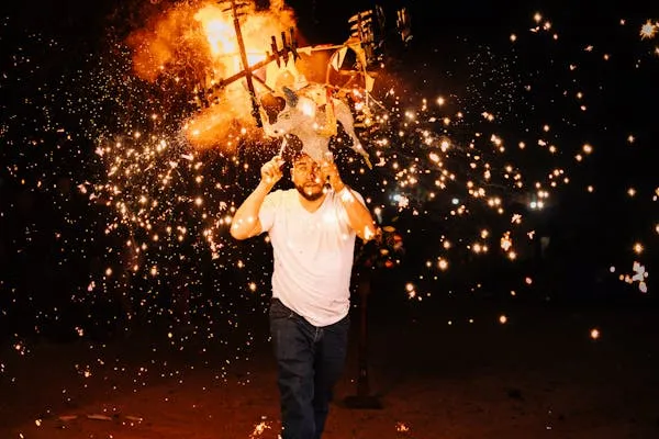 Joyful Celebration with Sparklers During a Night Festival