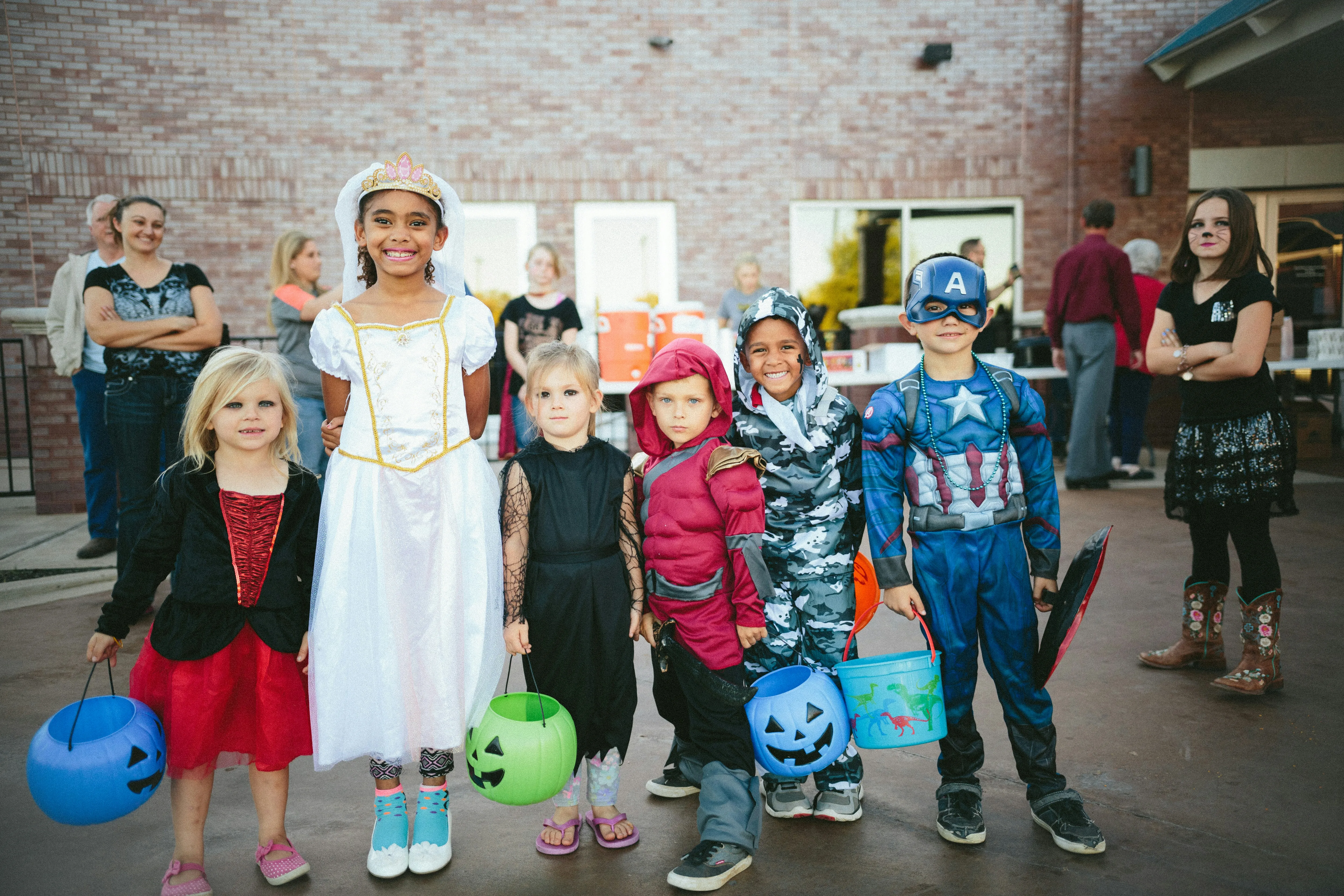 Kids in different Costume with Trick or Treating at Halloween