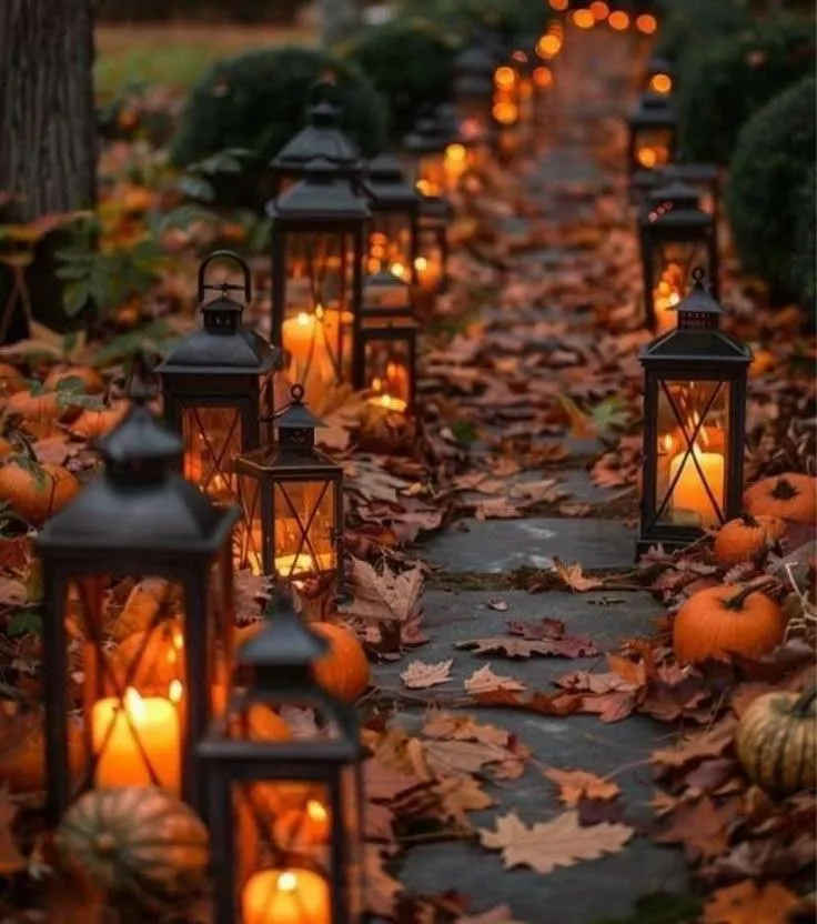 Lanterns and Pumpkins Lining Pathway For Halloween Wallpaper