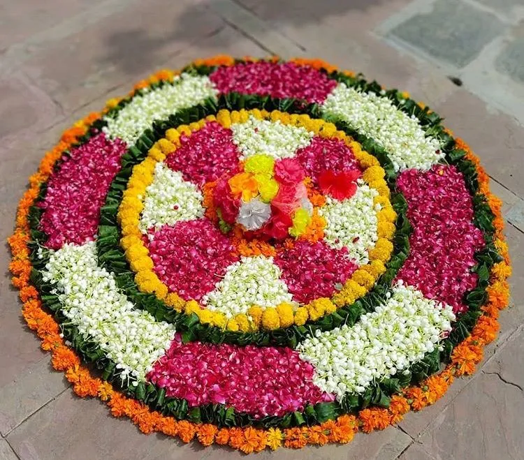 Layered pookolam with bright petals in circular style image