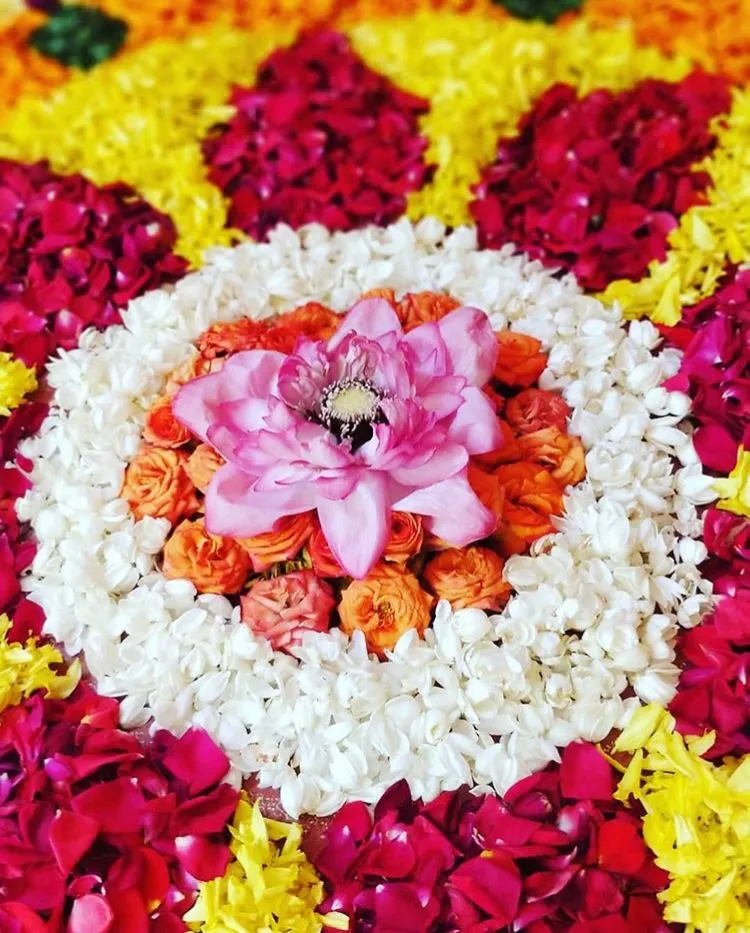 Lotus centerpiece Pookalam with jasmine and Roses image