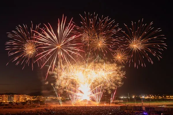 Majestic Fireworks Bursting in Multiple Colors over the City