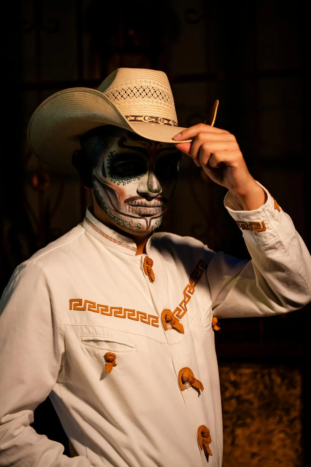 Man in Cowboy Costume and Face Paint for Halloween Wallpaper