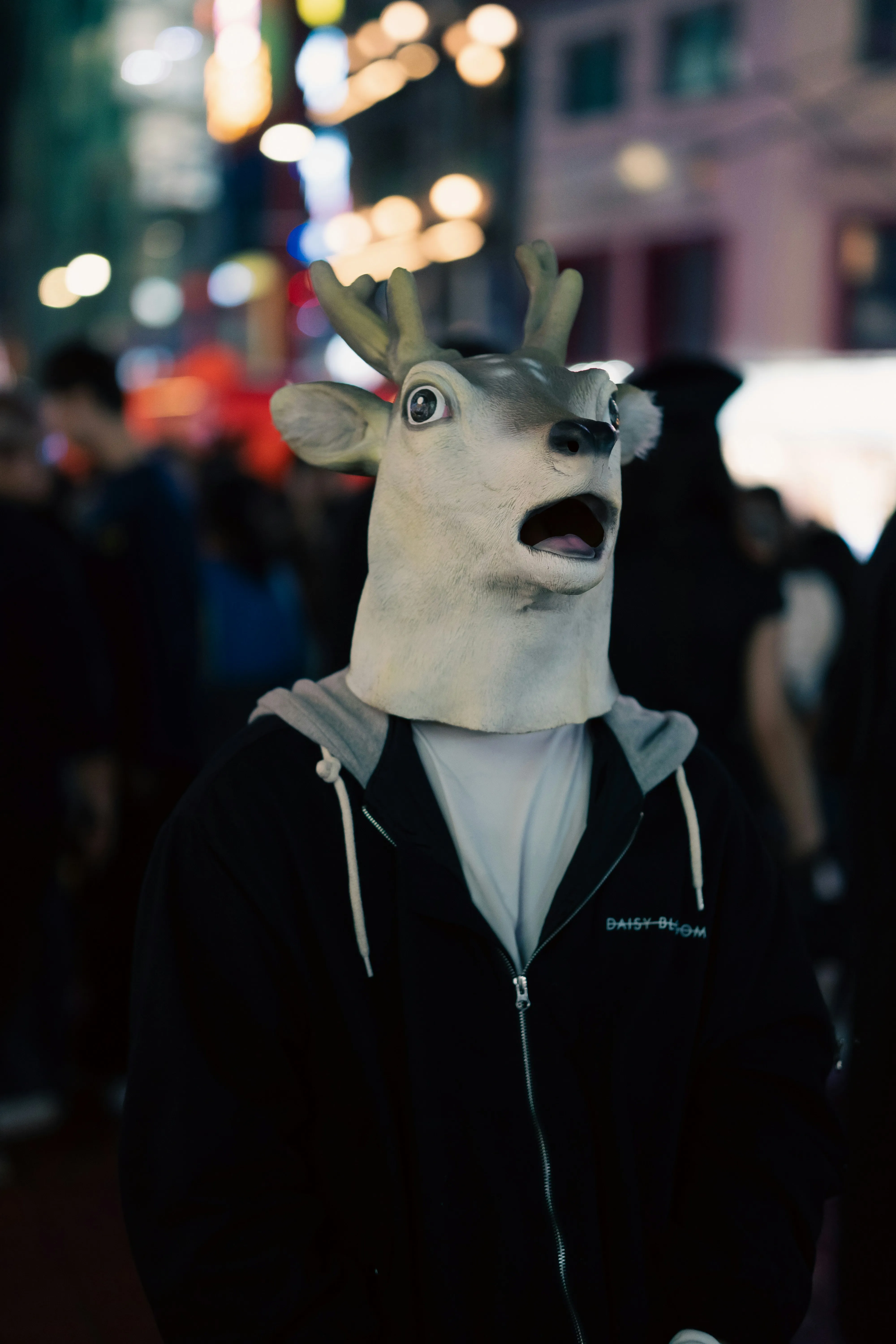 Man in Deer Mask Wearing Halloween Hoodie Costume Wallpaper