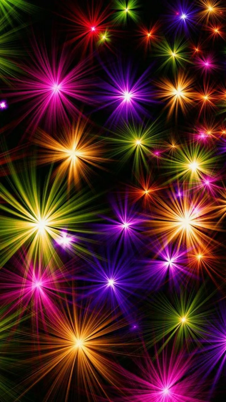 Multicolored fireworks sparkling in a star like pattern