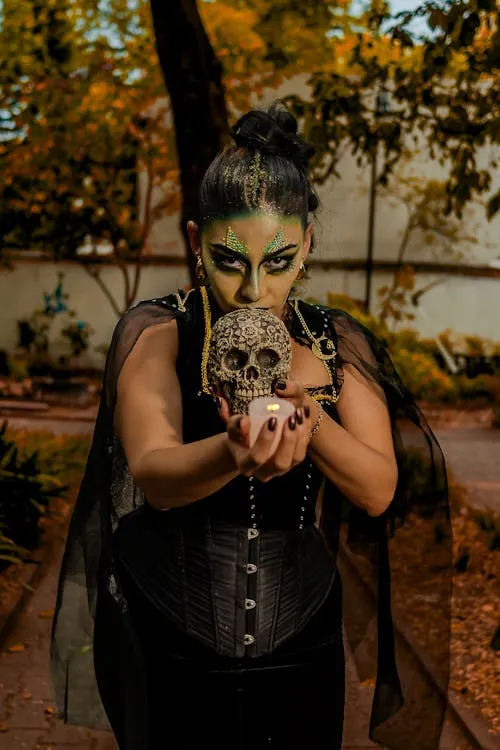 Mystical Halloween Look with Skull and Green Makeup