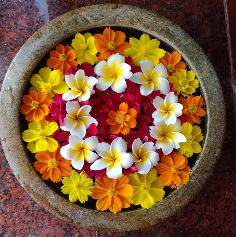 Onam Bowl decoration with fresh colourful flowers image